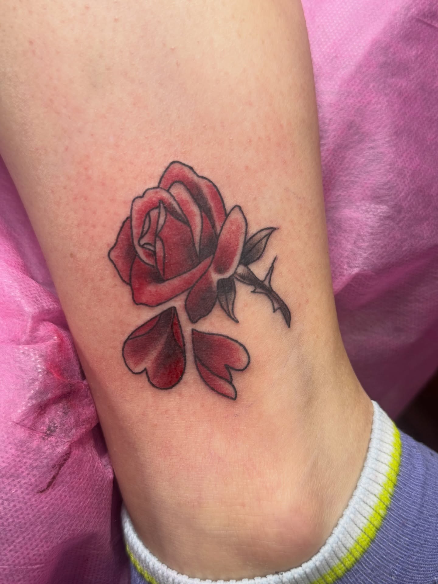 Rose realism tattoo on the forearm by Teagan Rachel, Millcreek, Utah