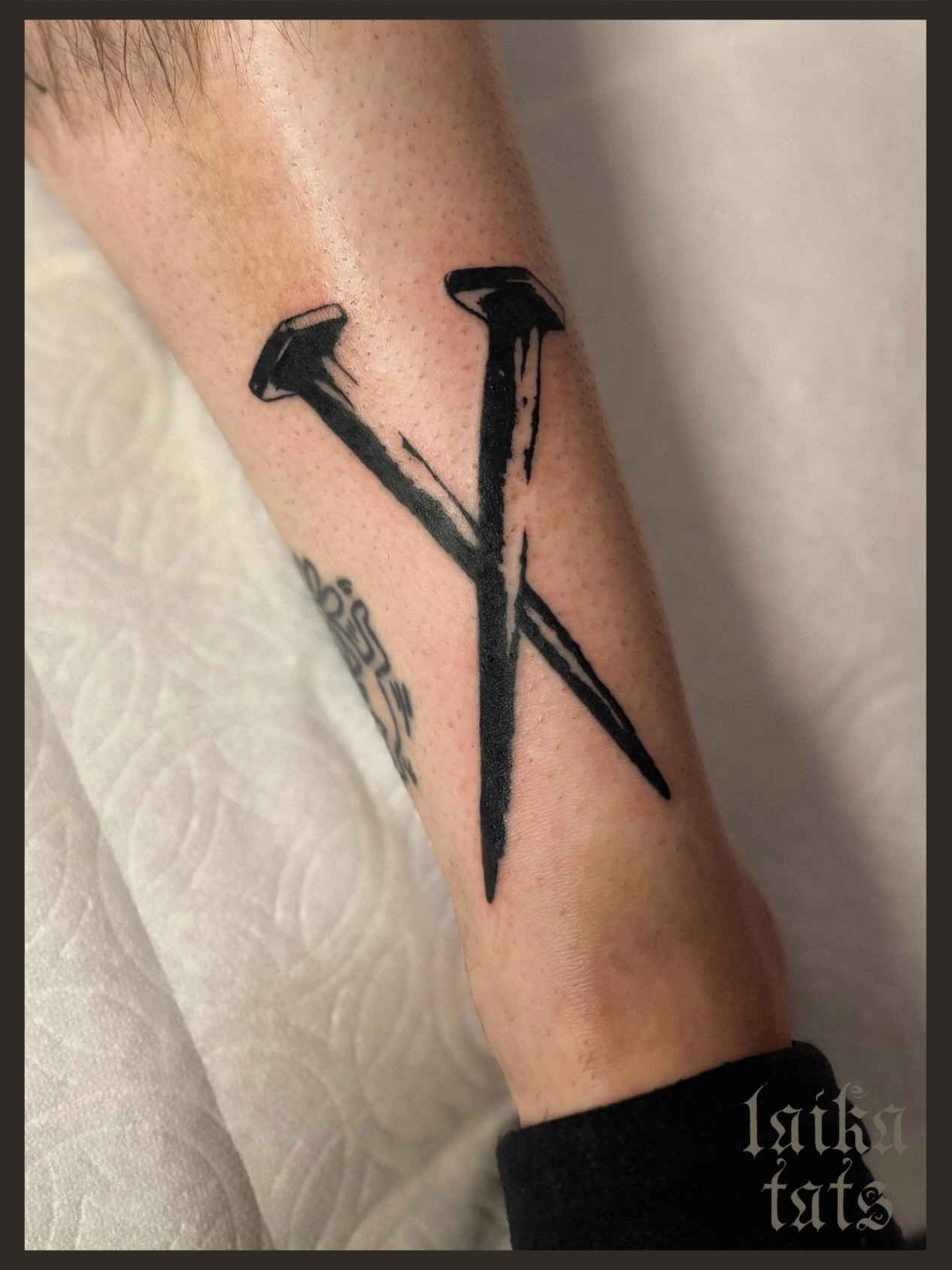 Nails black and grey tattoo on the forearm by laika ✶ pdx tattoo, Portland, Oregon