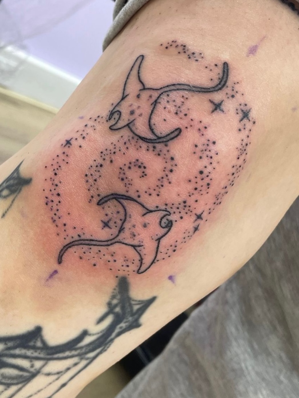 Rays and stars dotwork tattoo on the forearm by elly, Oakham