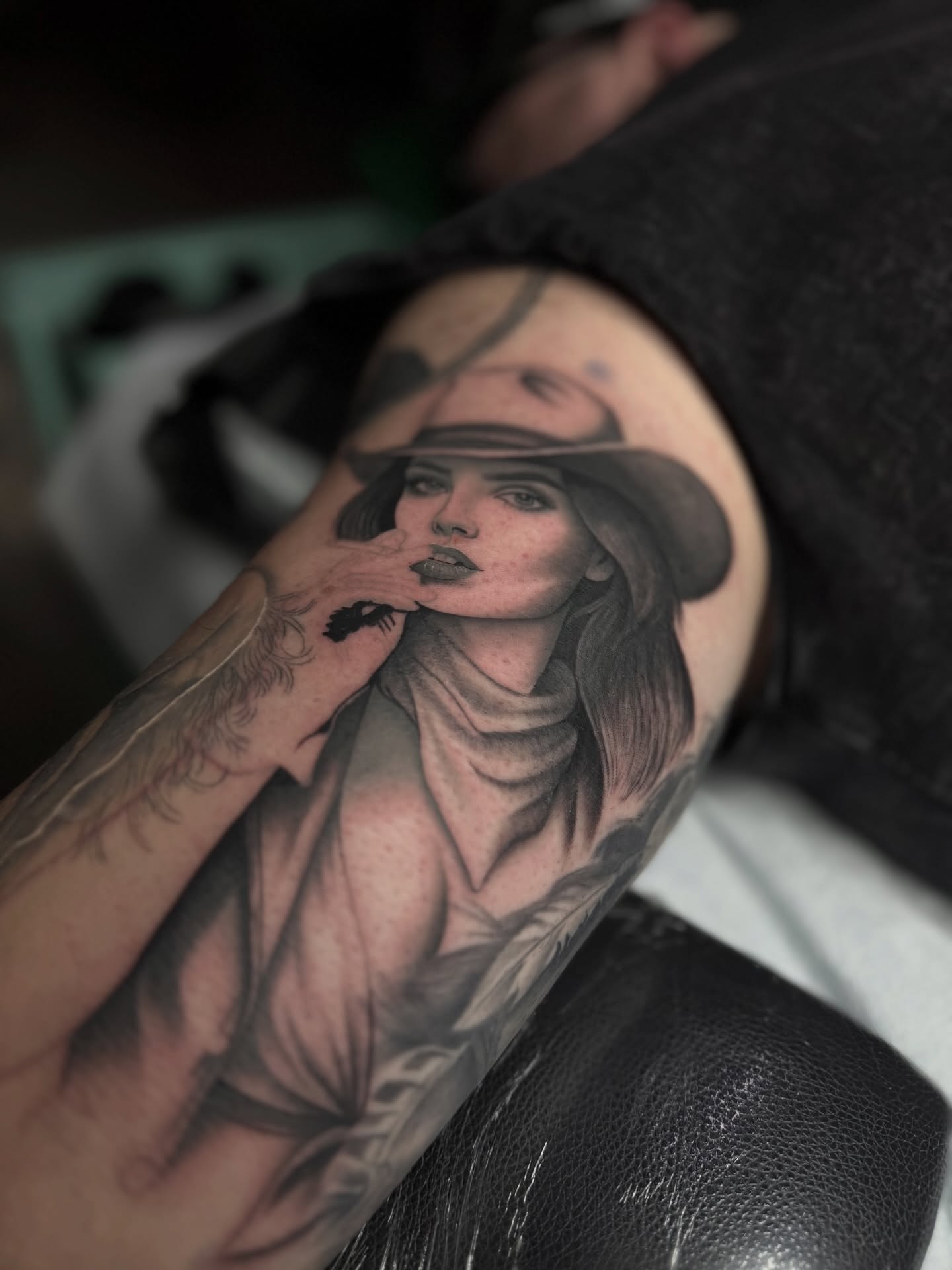 Woman wearing hat realism tattoo on the forearm by Tay 🥀