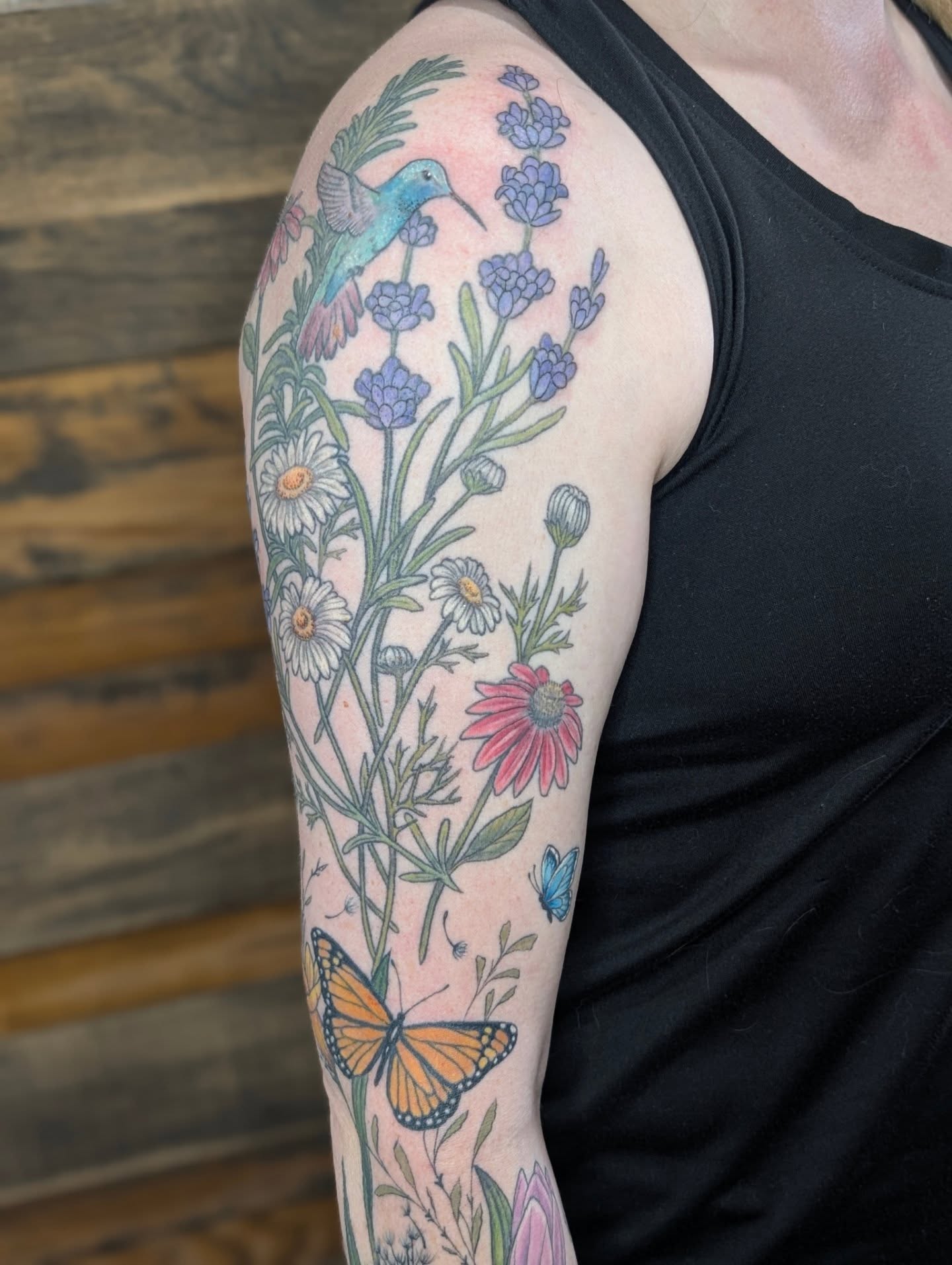 Botanical bouquet new school tattoo on the forearm by SHOP53 Tattoo & Art