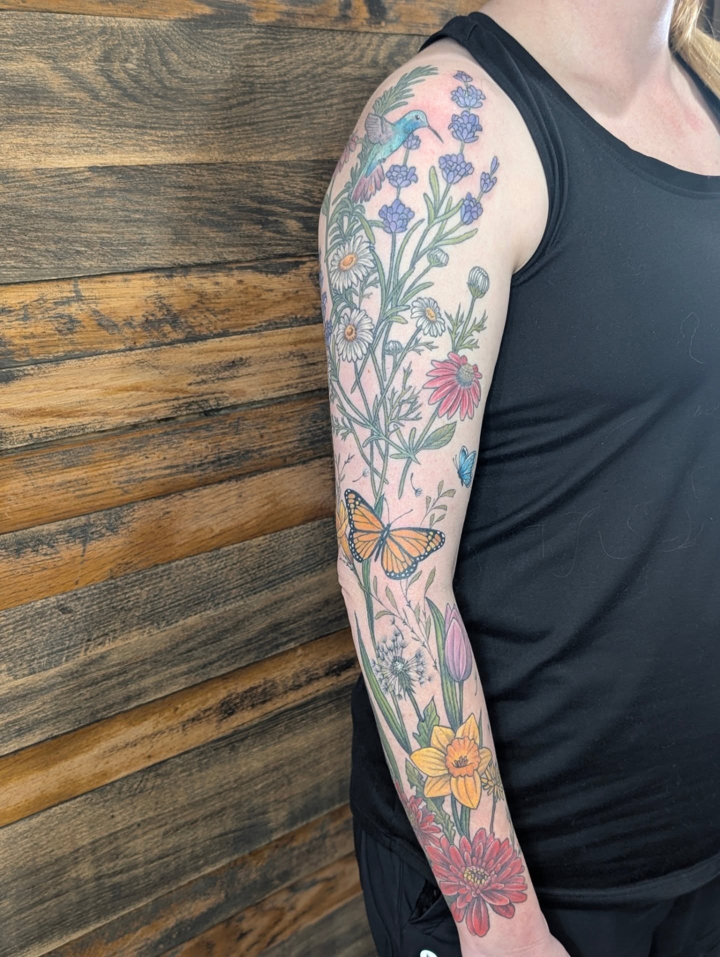 Floral bouquet new school tattoo on the forearm by SHOP53 Tattoo & Art