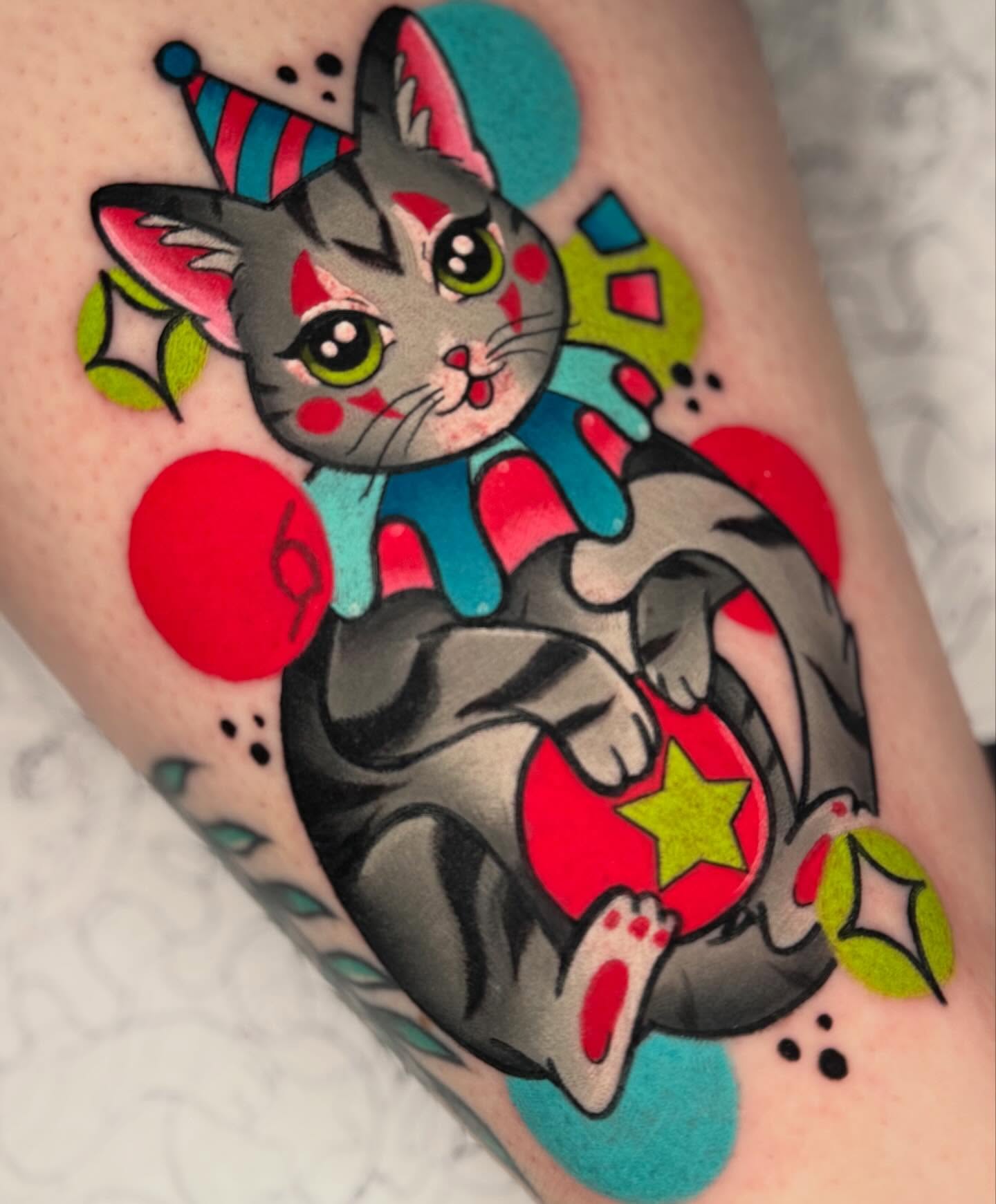 Cat American traditional tattoo on the forearm by Brianna Dickson