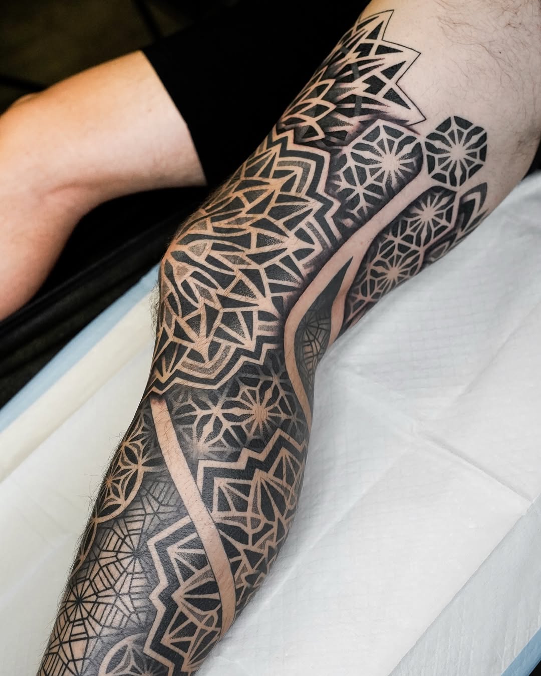 Tattoo by @rjxdots — geometric, blackwork