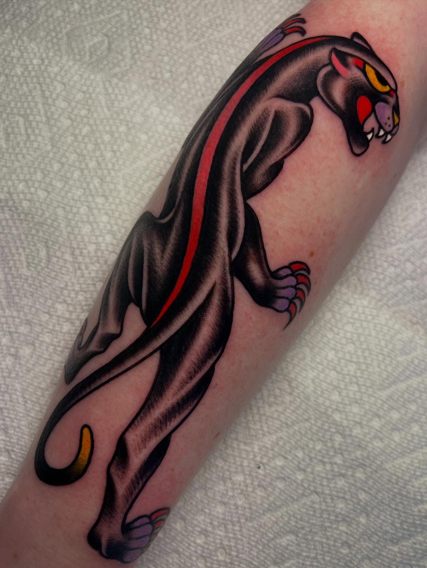 Panther American traditional tattoo on the forearm by ᴍᴀᴛᴛ ᴀʟᴇxᴀɴᴅᴇʀ