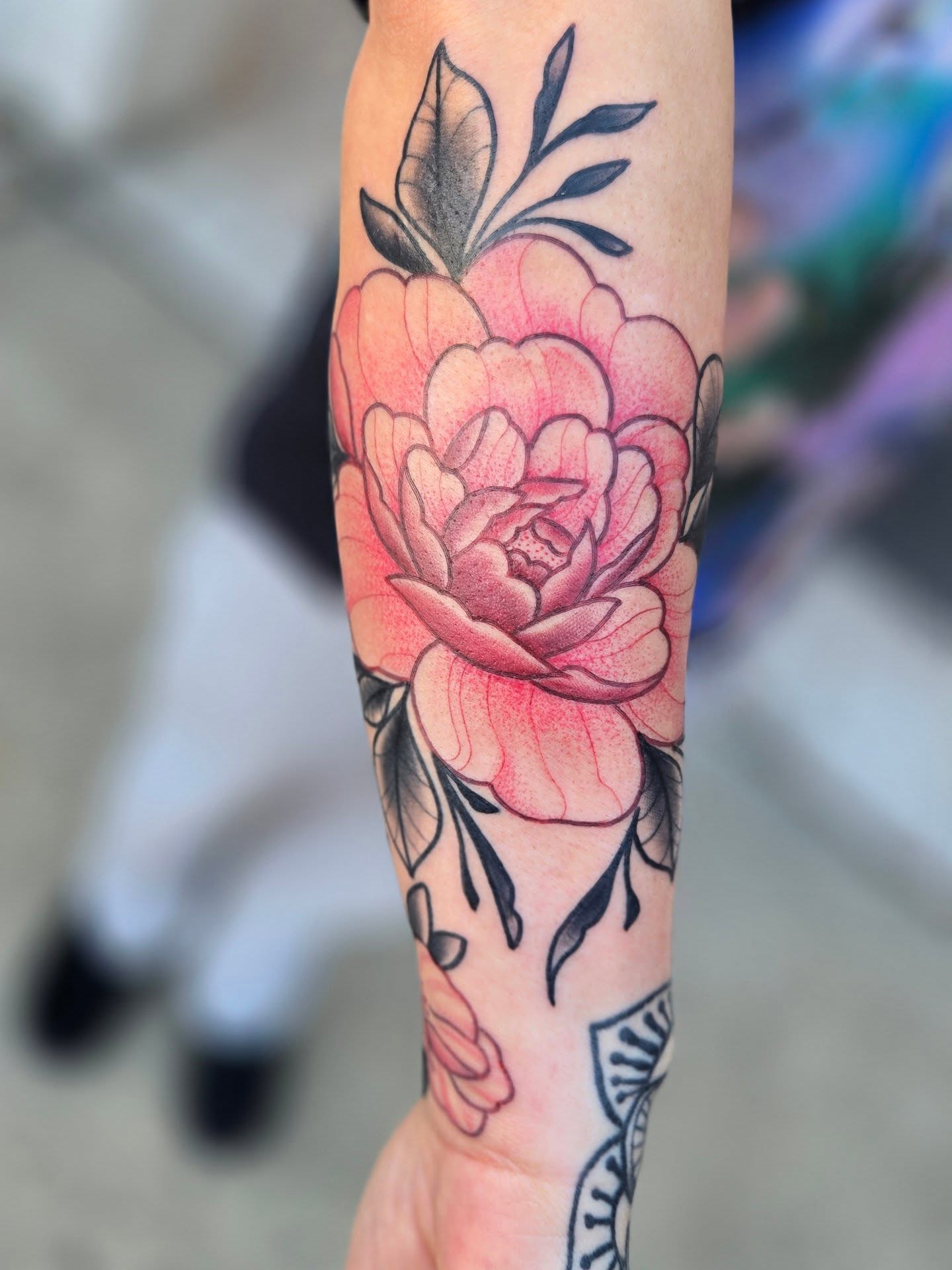 Peony American traditional tattoo on the forearm by Angel O'Connor Tattoos
