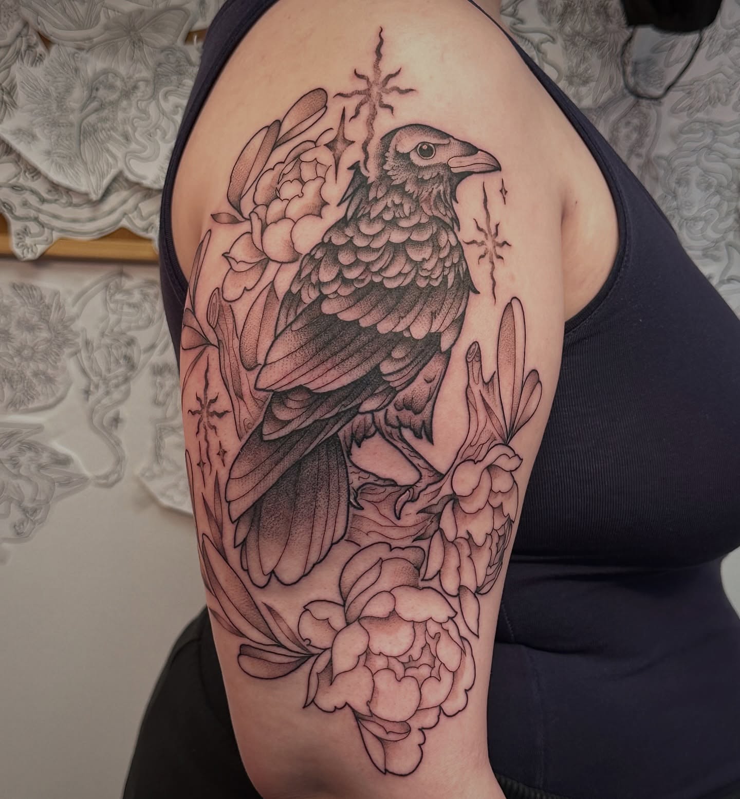 Crow and flowers black and grey tattoo on the shoulder by TATTOOLIZARD (James)