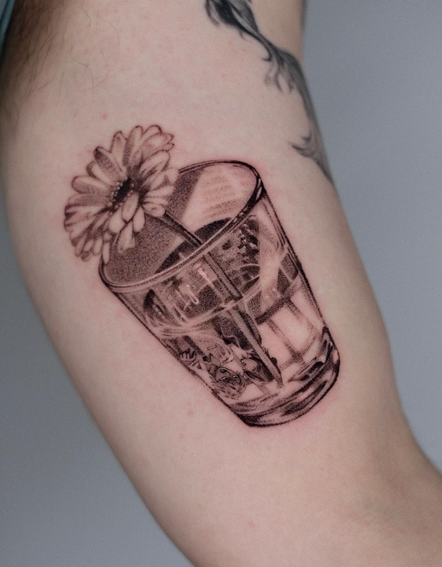 Flower in glass black and grey tattoo on the forearm by Anime, Amsterdam, Noord-Holland