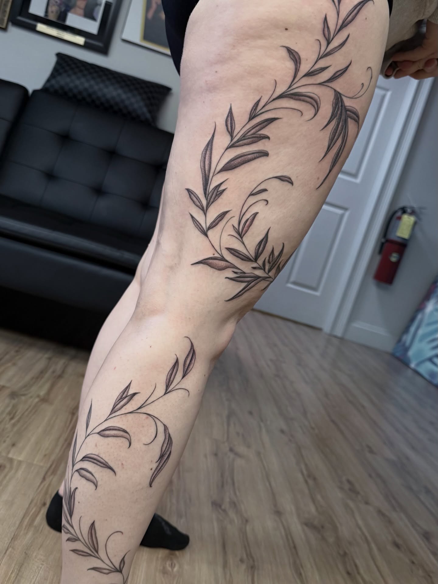 Leafy vine black and grey tattoo on the forearm by Gilberto Flores Nava