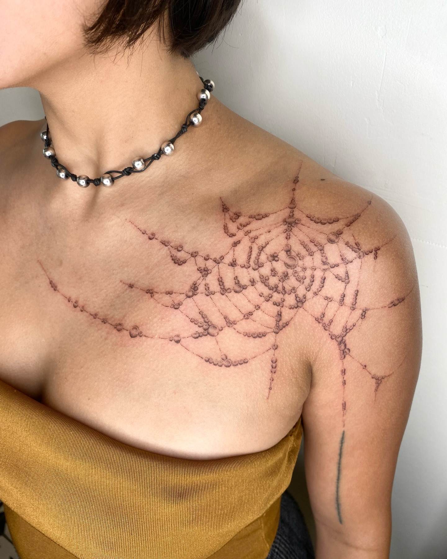 Spider web dotwork tattoo on the chest by ๐ป๐๐๐๐๐๐๐ โงห*ยฐเฟ