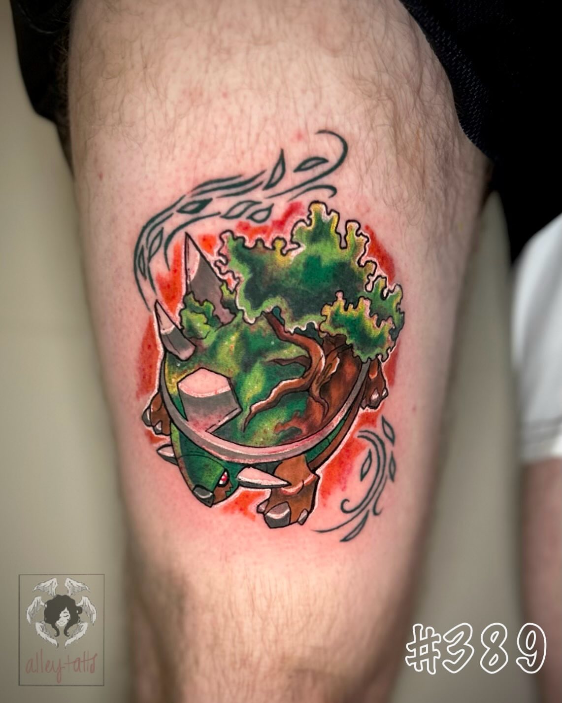 Tree with helmet watercolor tattoo on the thigh by Alex