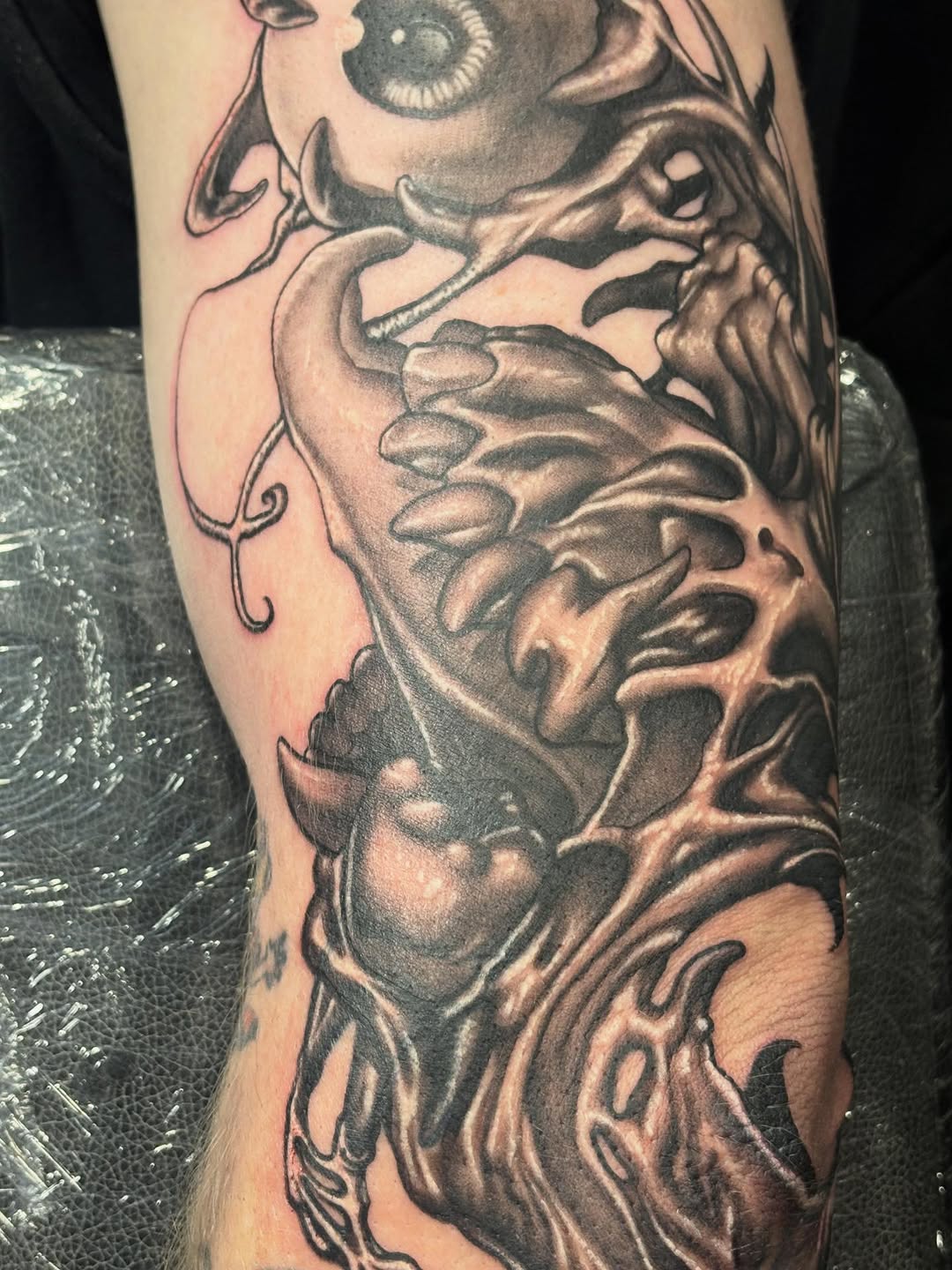 Tattoo by @sladesink — dark_realism, black_and_grey