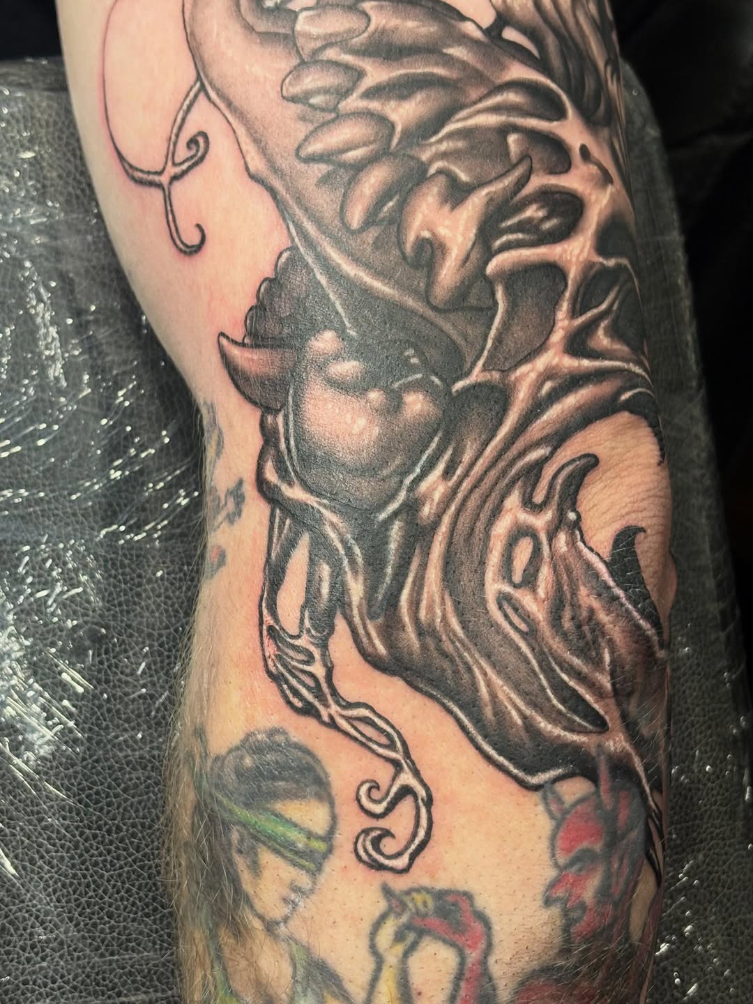 Tattoo by @sladesink — dark_realism, black_and_grey