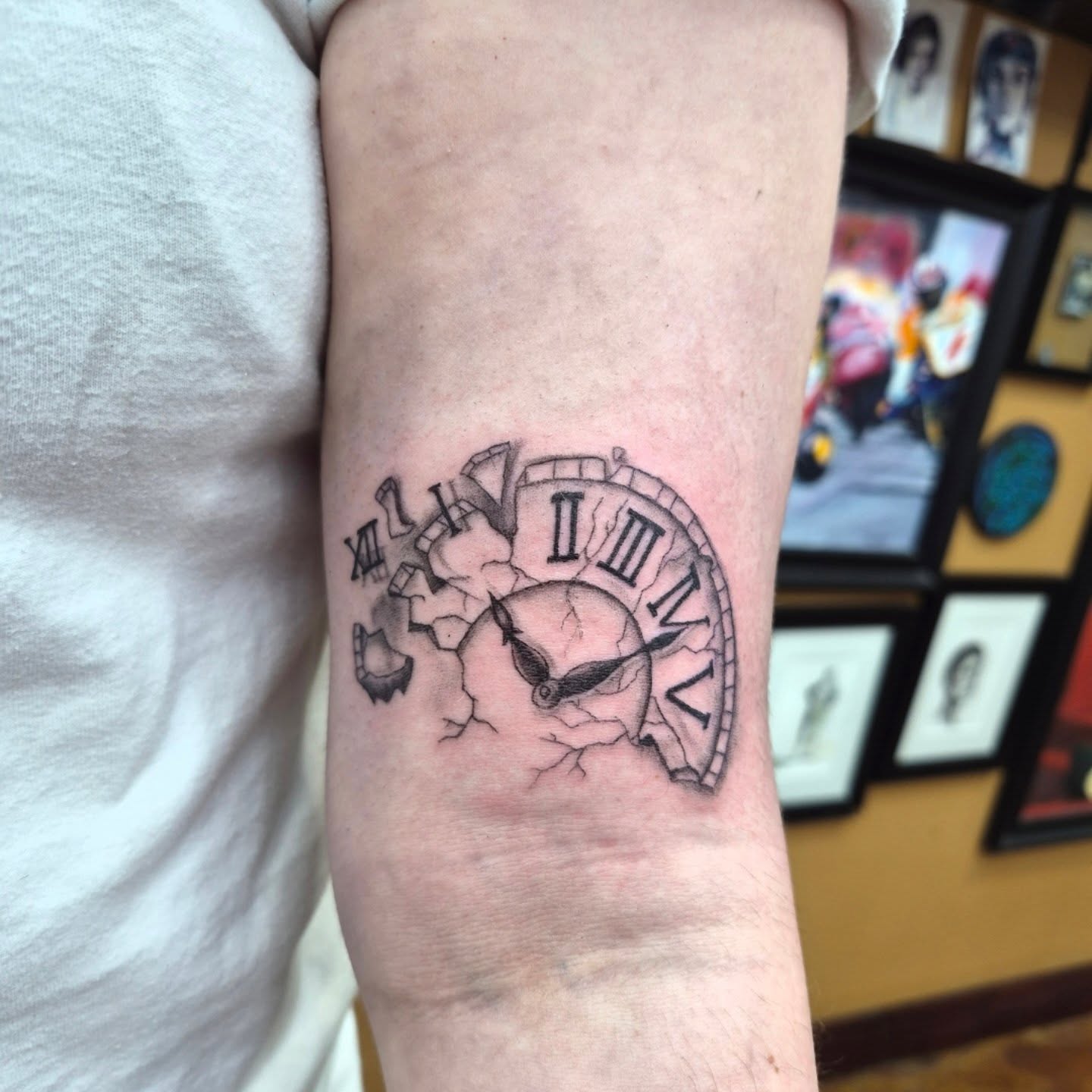 Clock realism tattoo on the forearm by Chris Bell