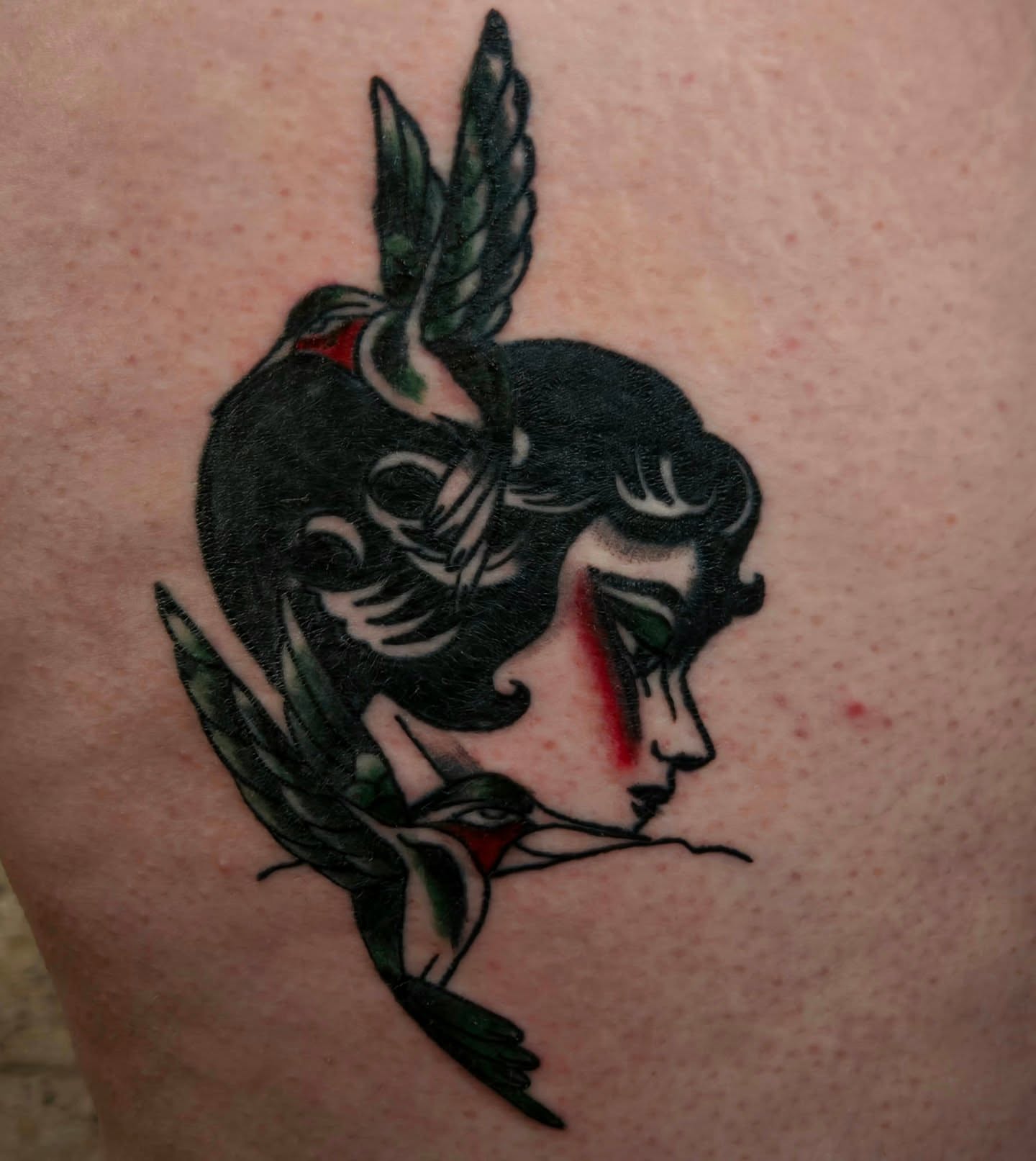 Woman with wings American traditional tattoo on the shoulder by Lane