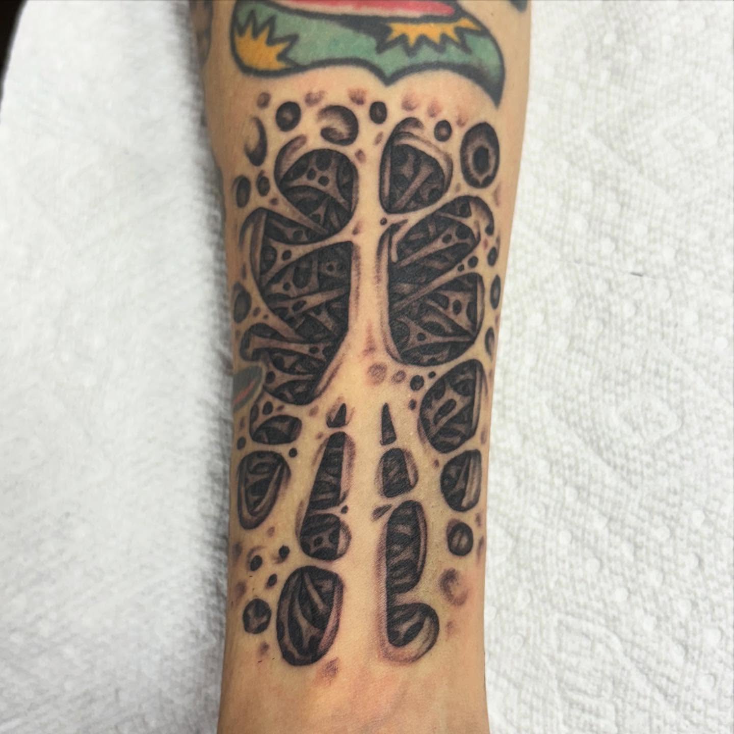 Abstract tree geometric tattoo on the forearm by Brendan Smith