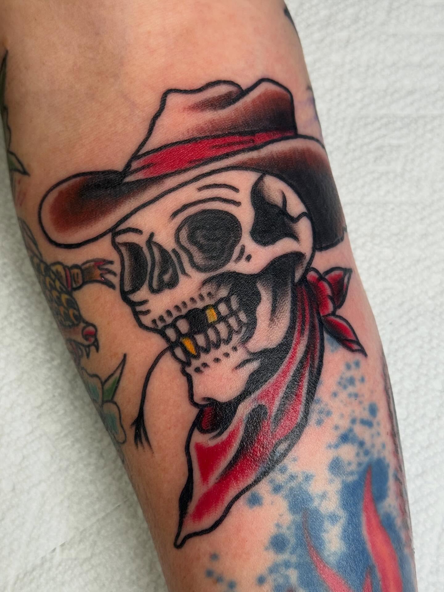 Cowboy skull American traditional tattoo on the forearm by Eric James, Columbus, Ohio