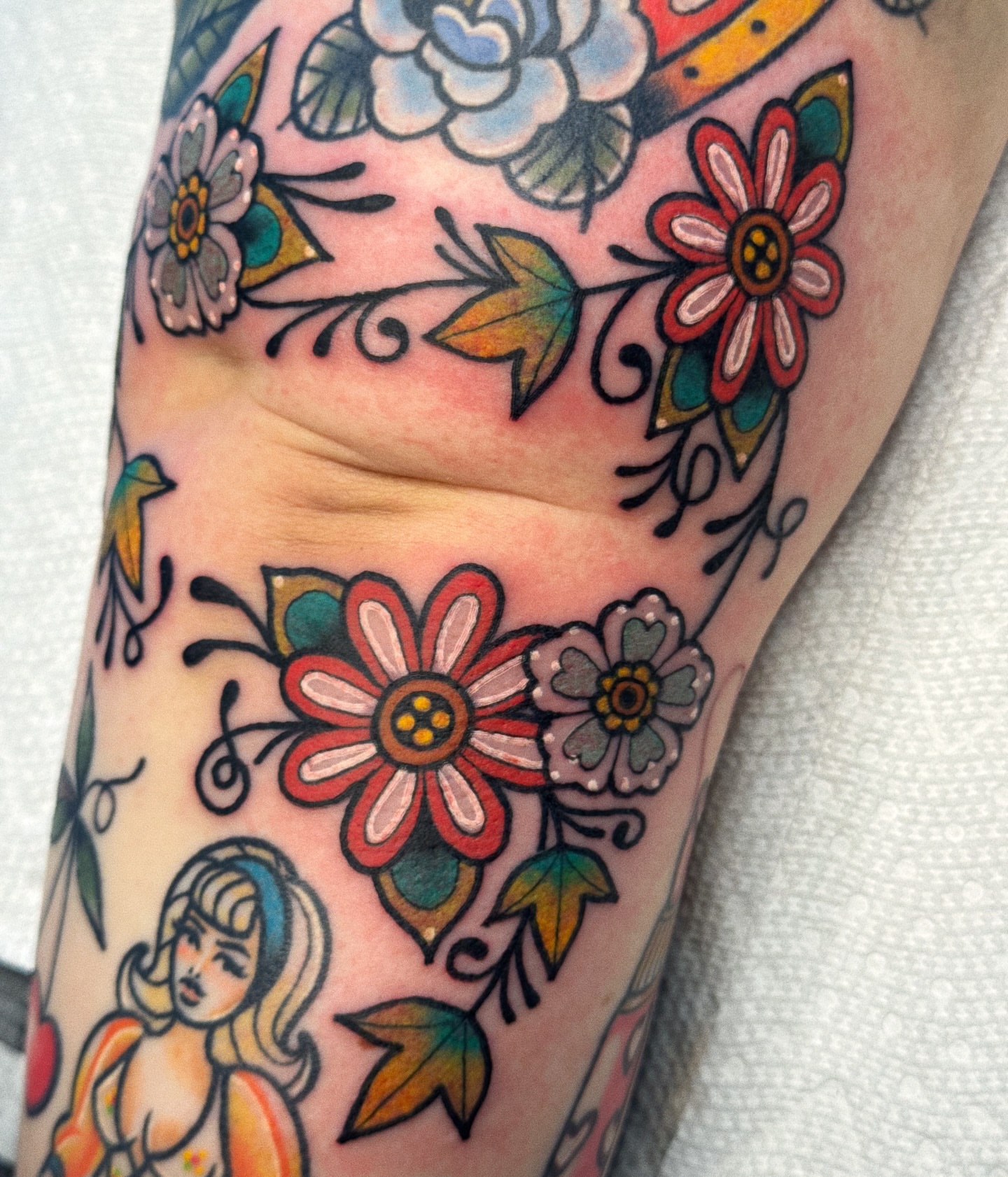Floral pattern American traditional tattoo on the forearm by 𝕷𝖆𝖚𝖗 𝕷𝖆𝖚𝖗