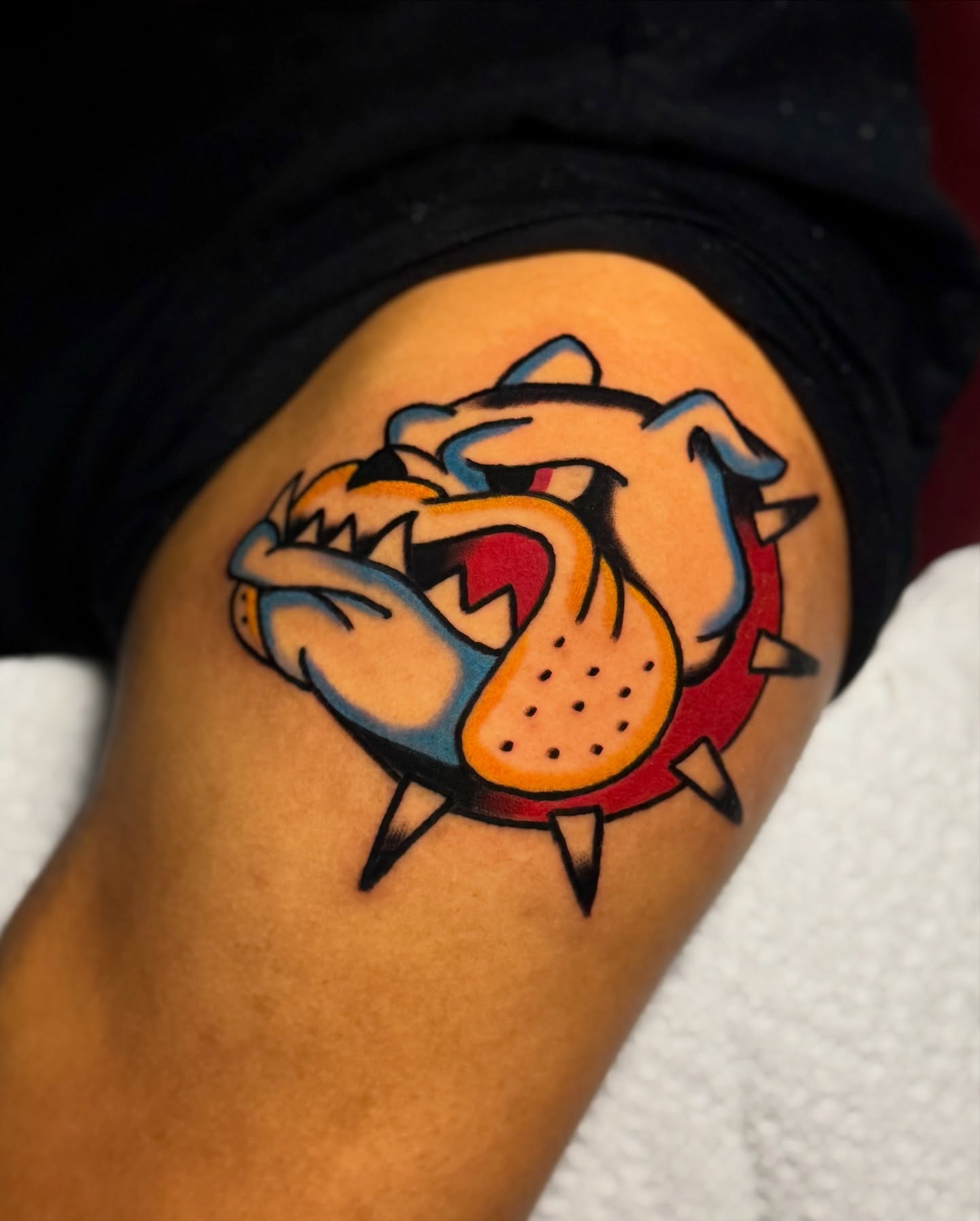 Bulldog American traditional tattoo on the thigh by Javin Klingelhoefer Mosley