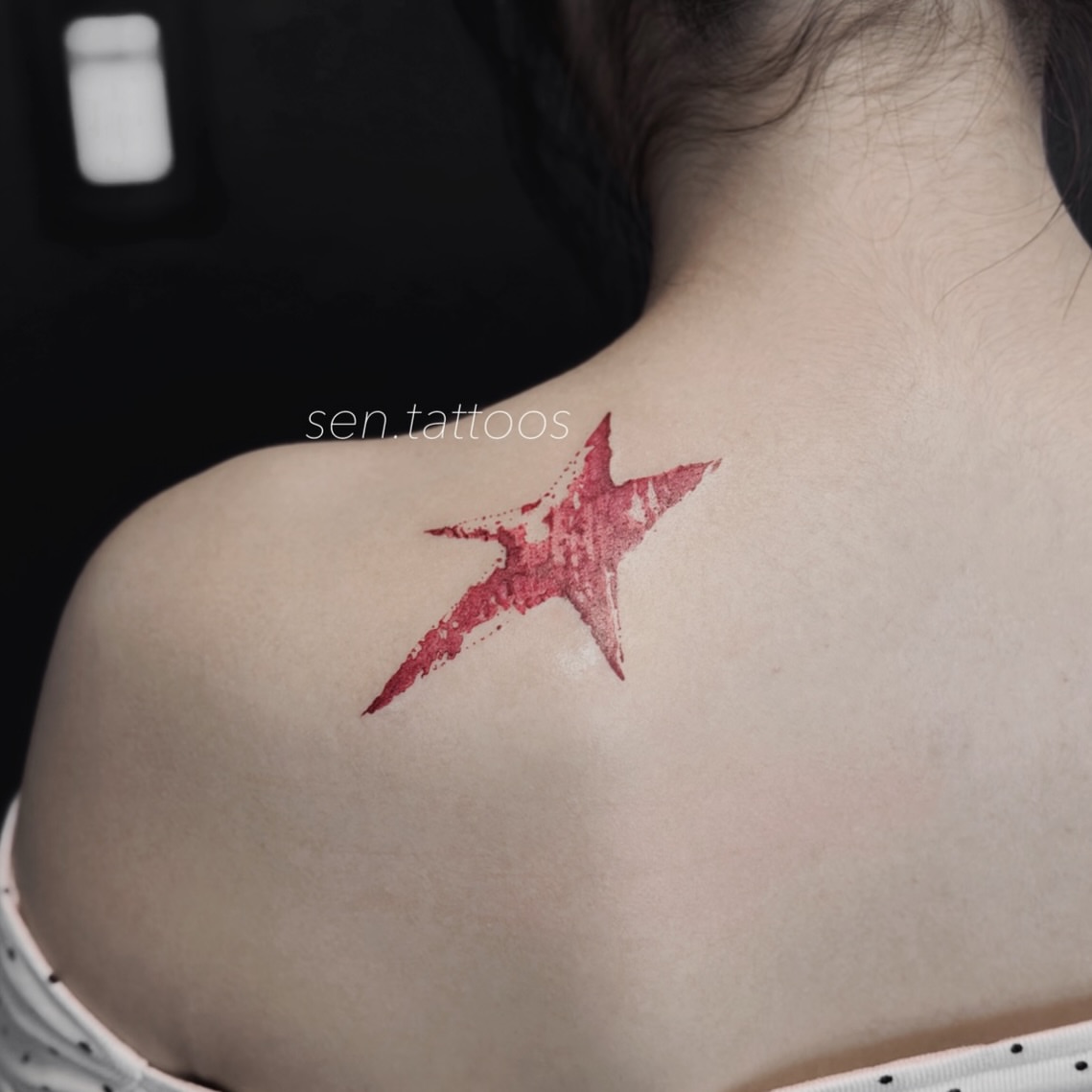 Star dotwork tattoo on the back by Sen Tattooer