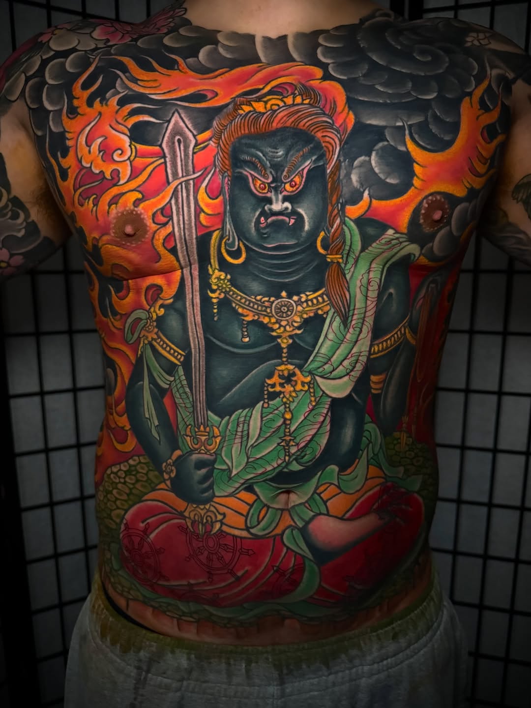 Fudo Myoo with flames Japanese tattoo on the back by 𝙉𝙄𝘾𝙆 𝘾𝘼𝙍𝙐𝙎𝙊, New York, New York