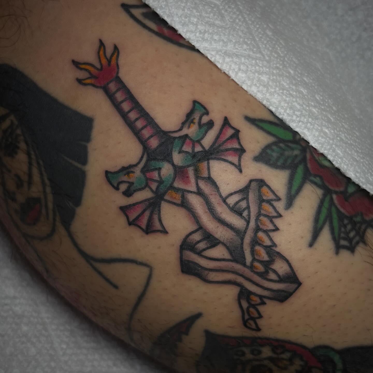 Dragon American traditional tattoo on the forearm by ππππππππ