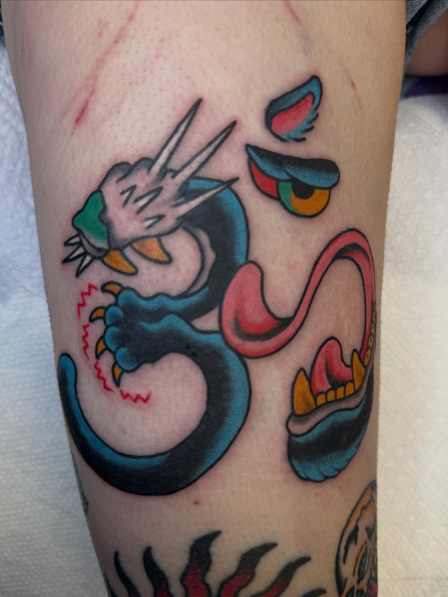 Dragon American traditional tattoo on the forearm by Brendan Willbern, Austin, Texas