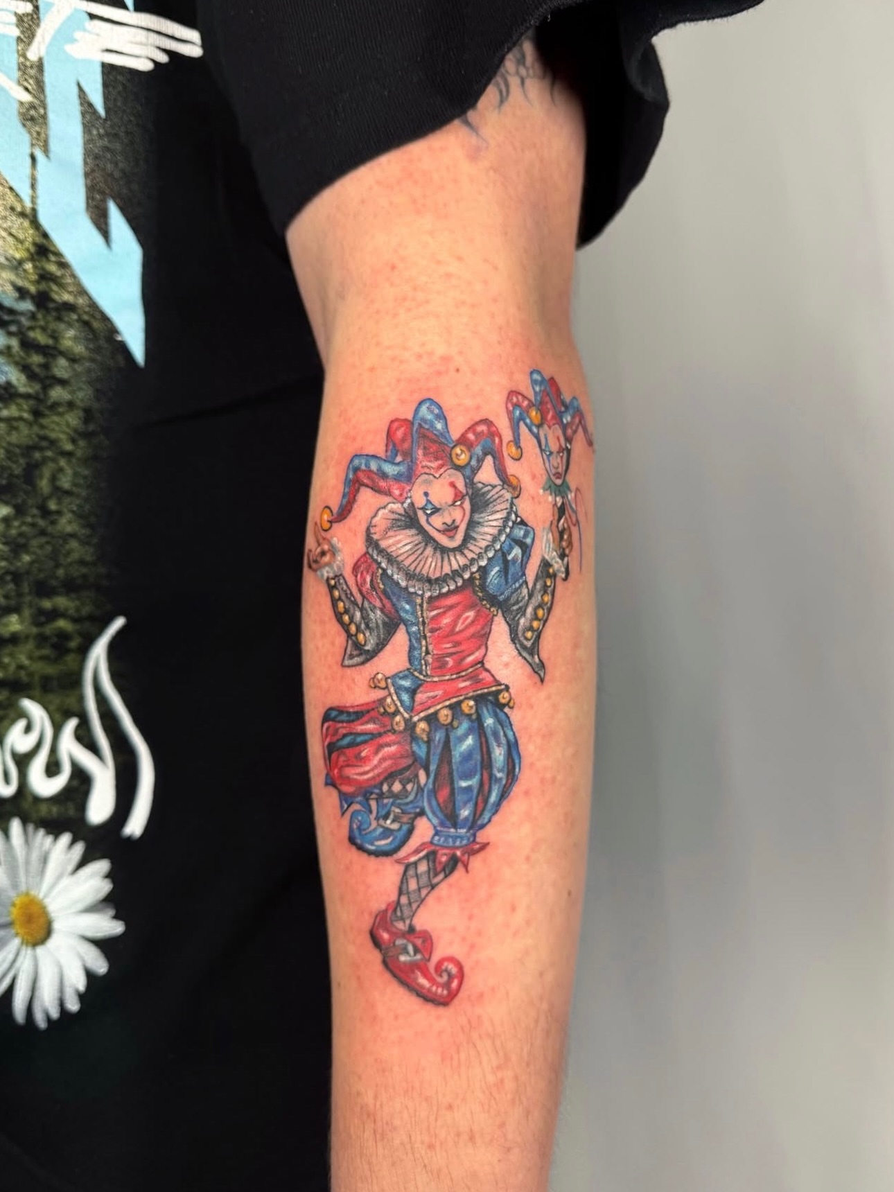 Jester realism tattoo on the forearm by Franky A Bonifacio, Seattle, Washington