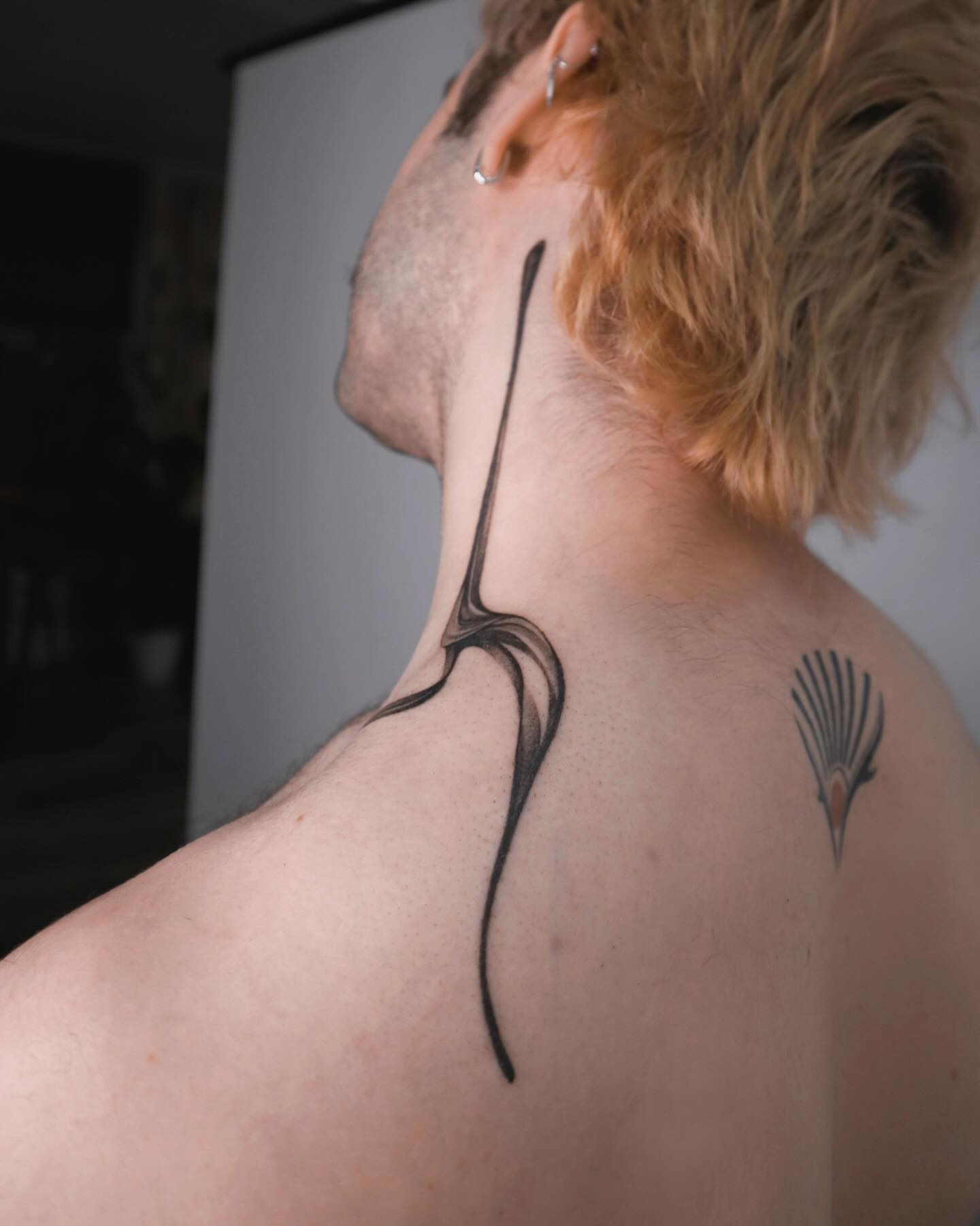 Abstract design geometric tattoo on the neck by River, New York, New York