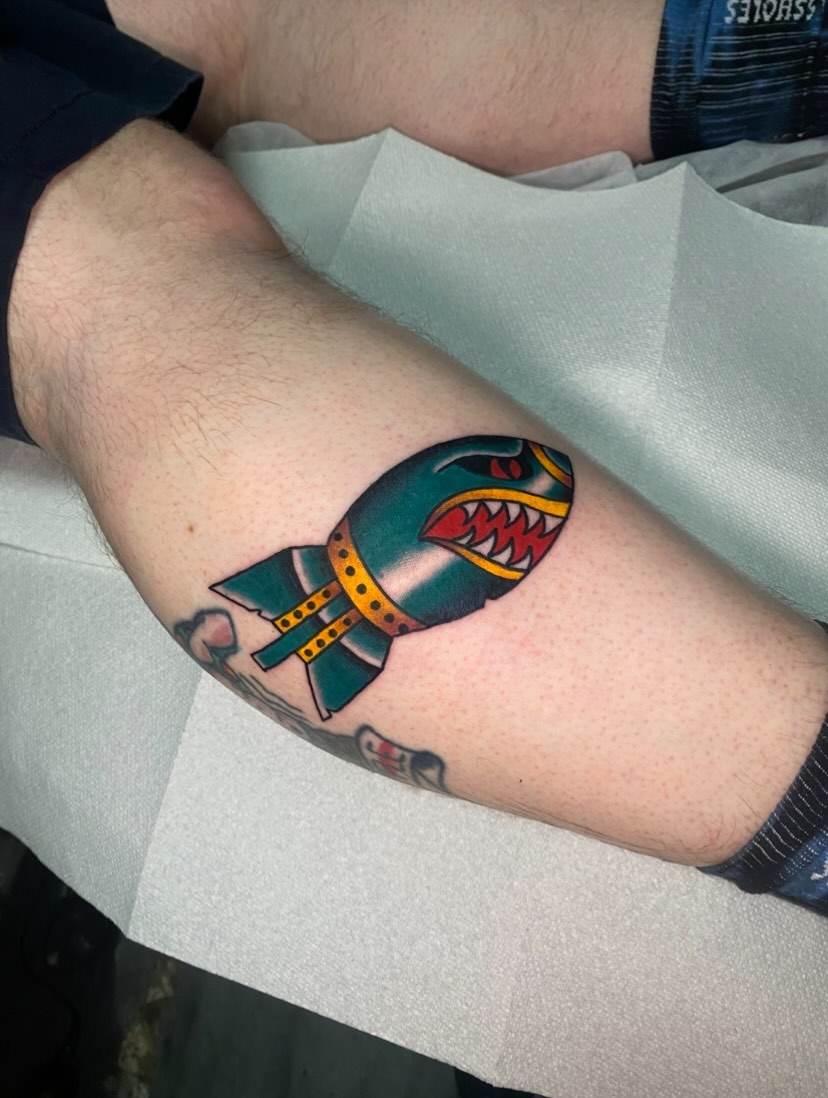 Rocket American traditional tattoo on the forearm by Nosferatu