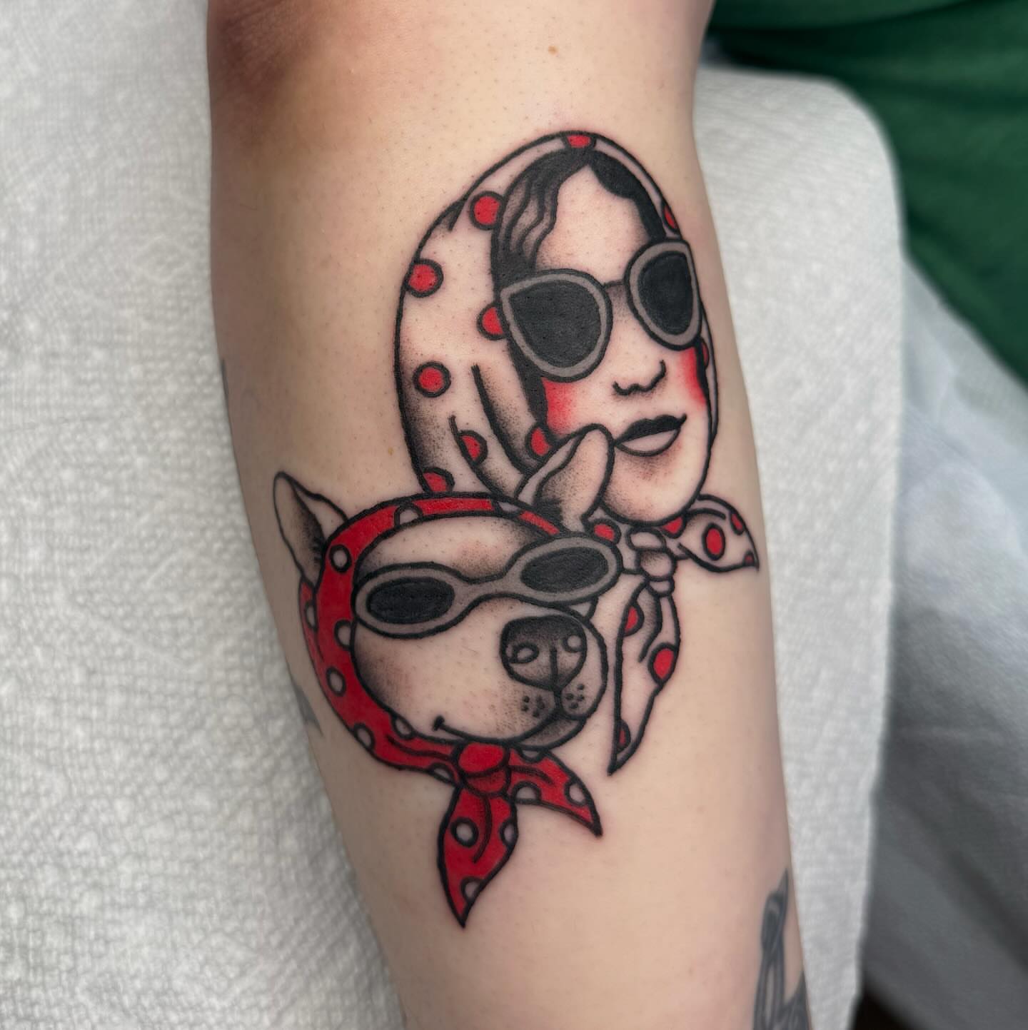 Woman and dog American traditional tattoo on the forearm by 𝕮𝖆𝖘𝖊𝖞 𝕭𝖆𝖘𝖍𝖊𝖗