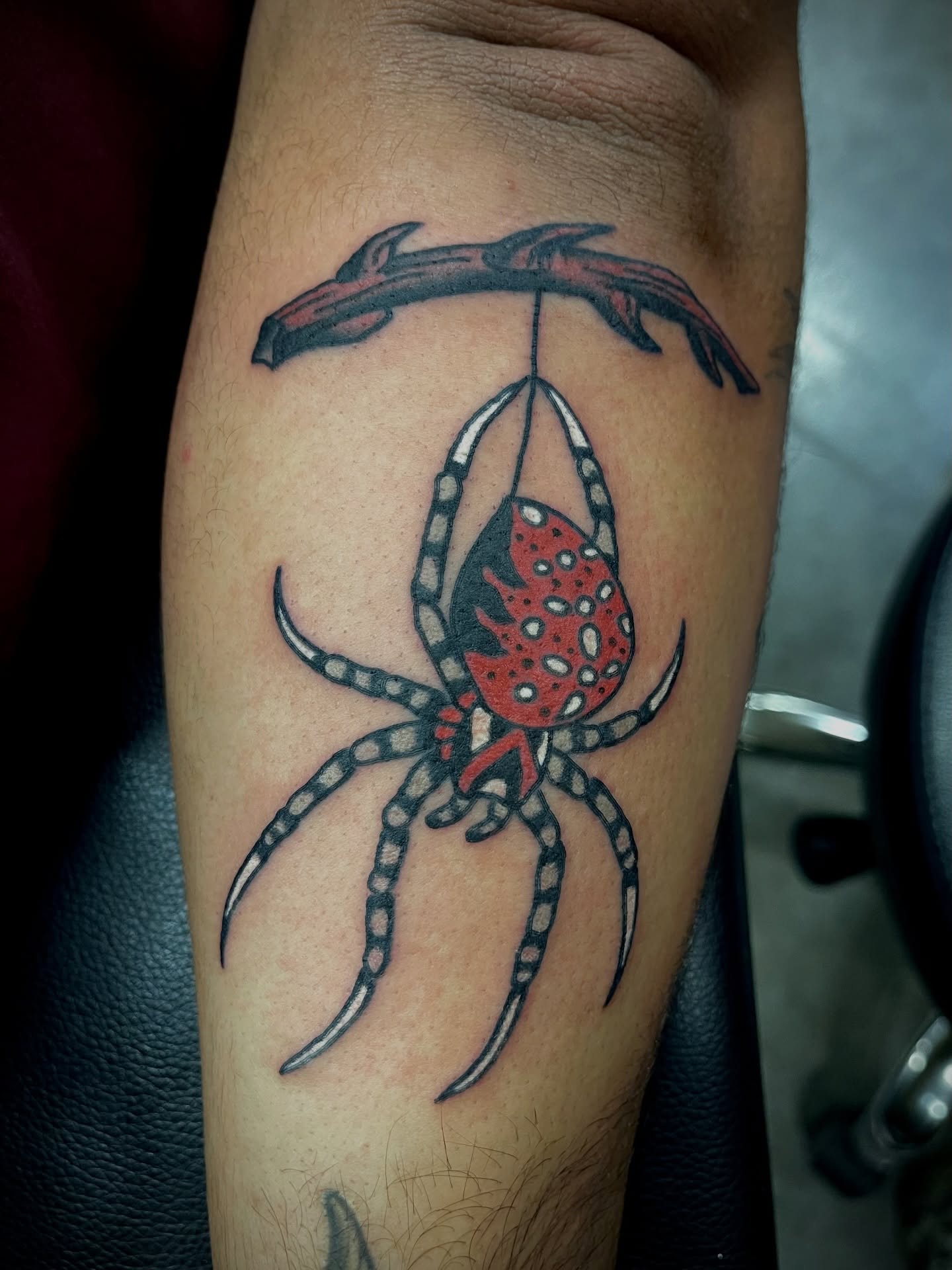 Spider dotwork tattoo on the forearm by Diego Treviño