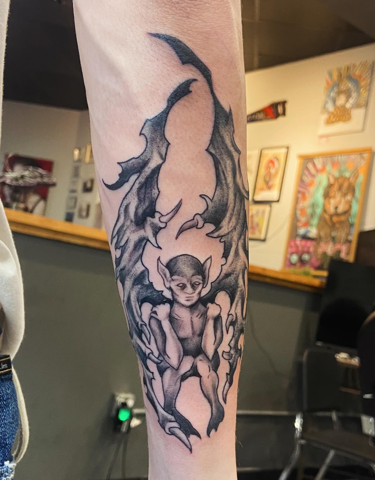 Elf in flames dotwork tattoo on the forearm by Sam Hearnen, Lawrence, Kansas
