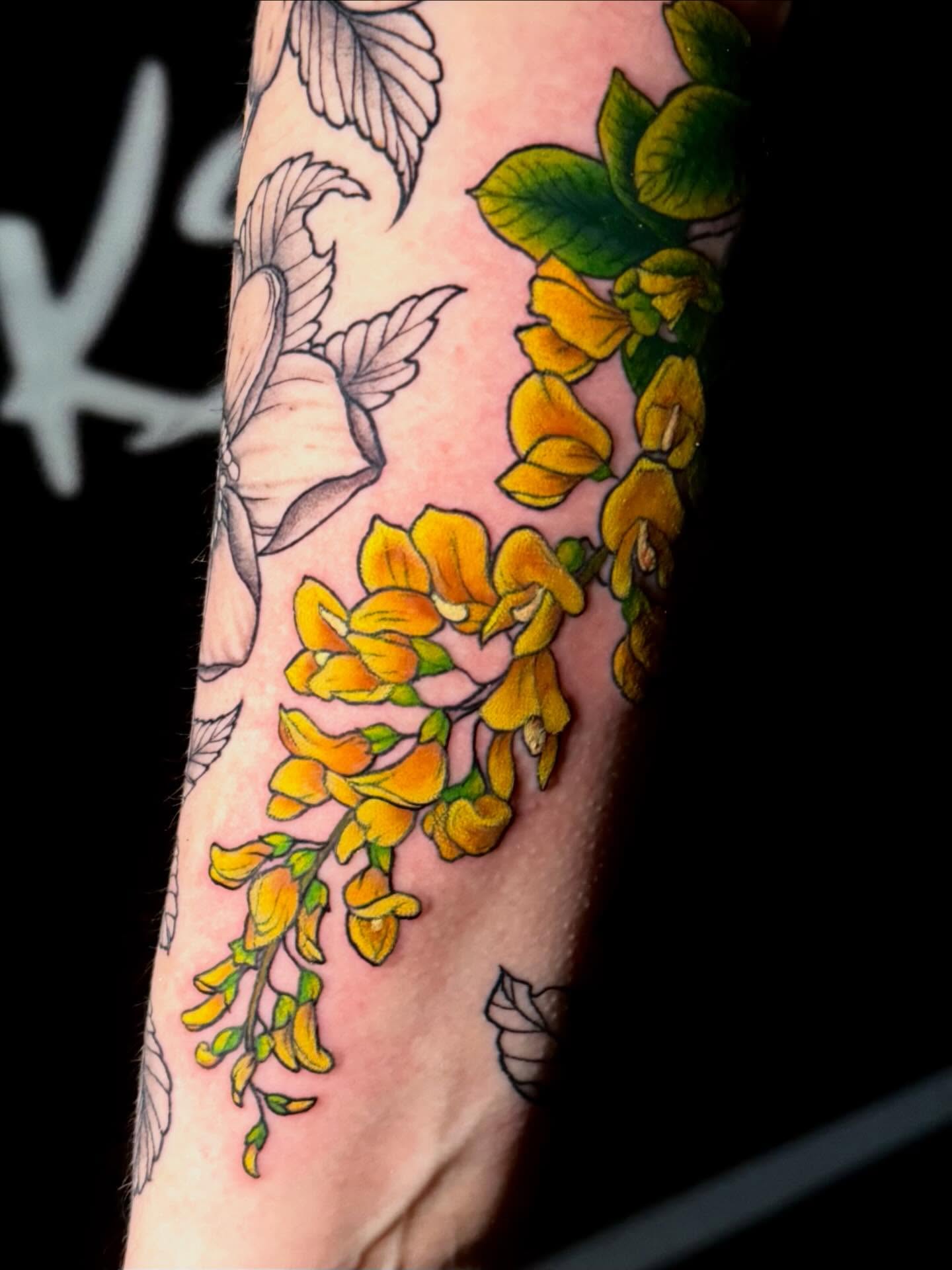 Yellow flowers dotwork tattoo on the forearm by Taylor Kay 🌿
