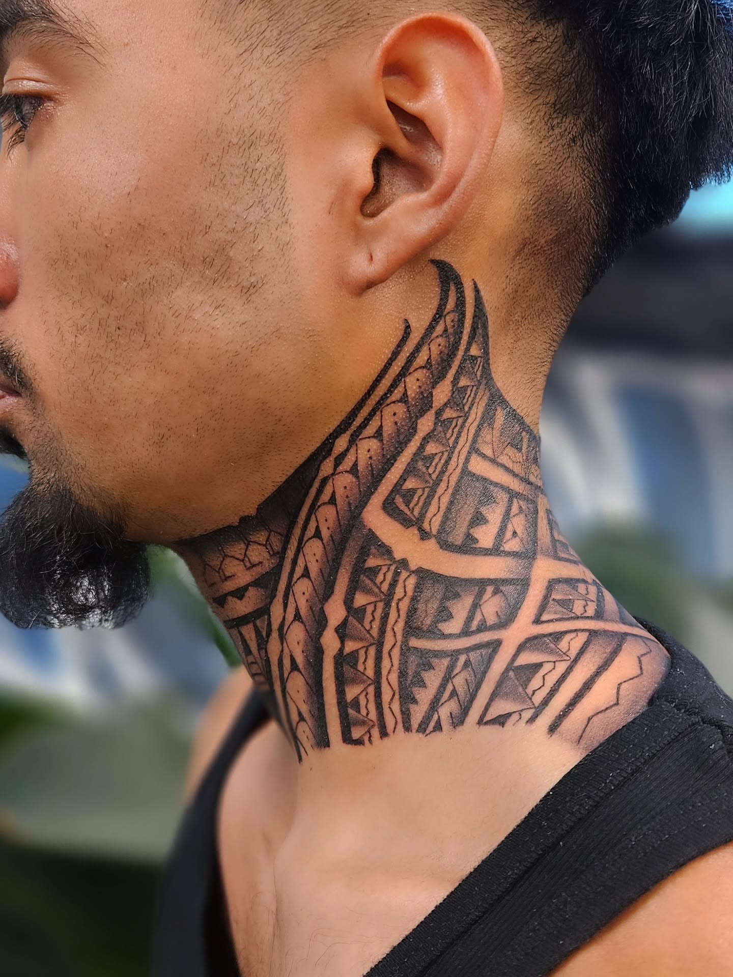 Tribal pattern tribal tattoo on the neck by Jo'el Acoba