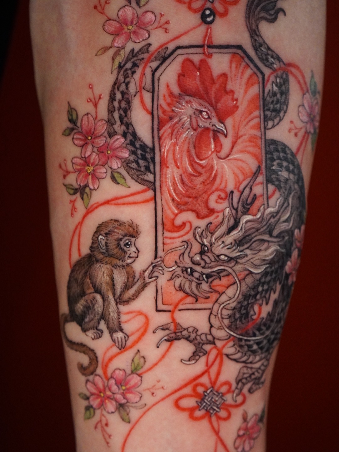 Rooster, dragon, monkey, cherry blossoms japanese irezumi tattoo on the forearm by 🌛 Lê Huỳnh🌜, Dallas, Texas