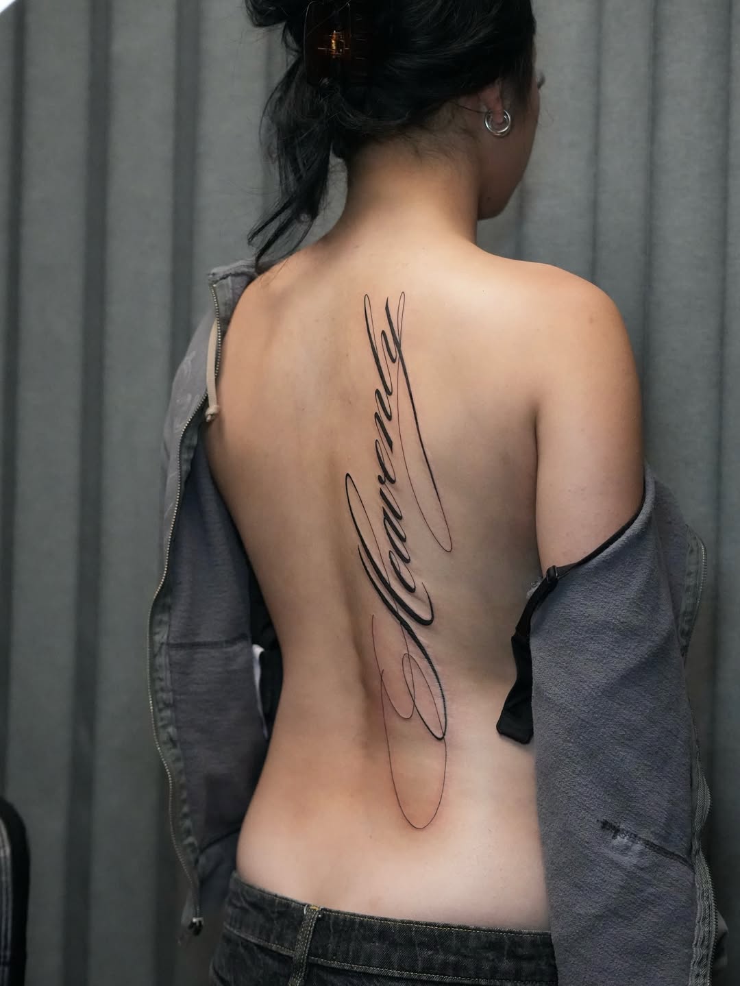 Script lettering lettering tattoo on the back by alyssa ⋆₊ ♱