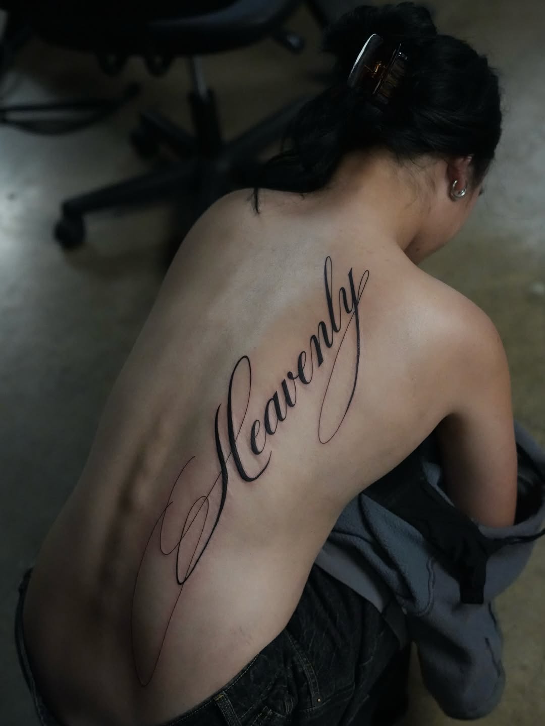 Script lettering lettering tattoo on the back by alyssa ⋆₊ ♱