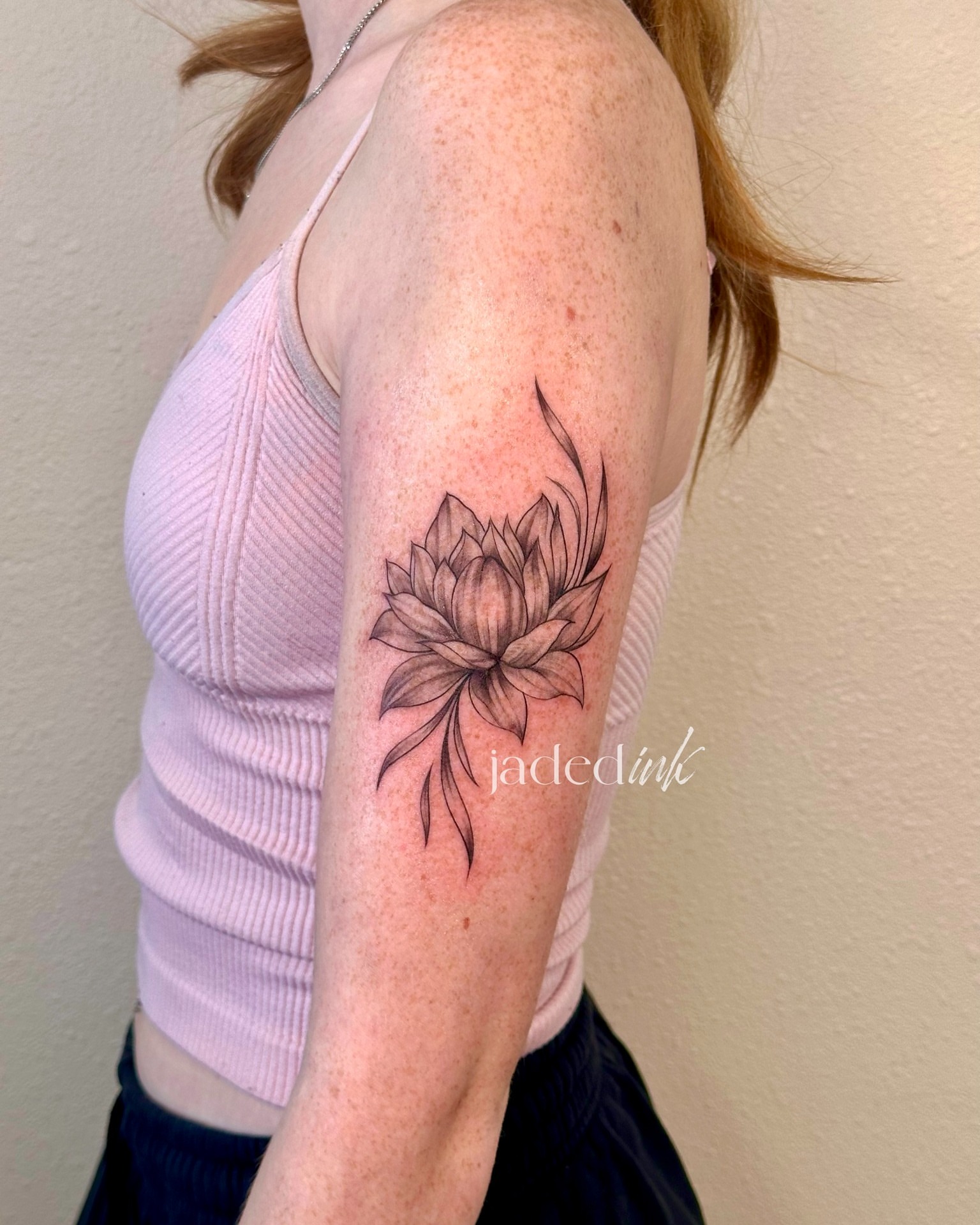 Lotus flower black and grey tattoo on the forearm by 𝑱𝒂𝒅𝒆𝒅 𝑰𝒏𝒌 𝑷𝒆𝒓𝒎𝒂𝒏𝒆𝒏𝒕 𝑴𝒂𝒌𝒆𝒖𝒑 & 𝑻𝒂𝒕𝒕𝒐𝒐