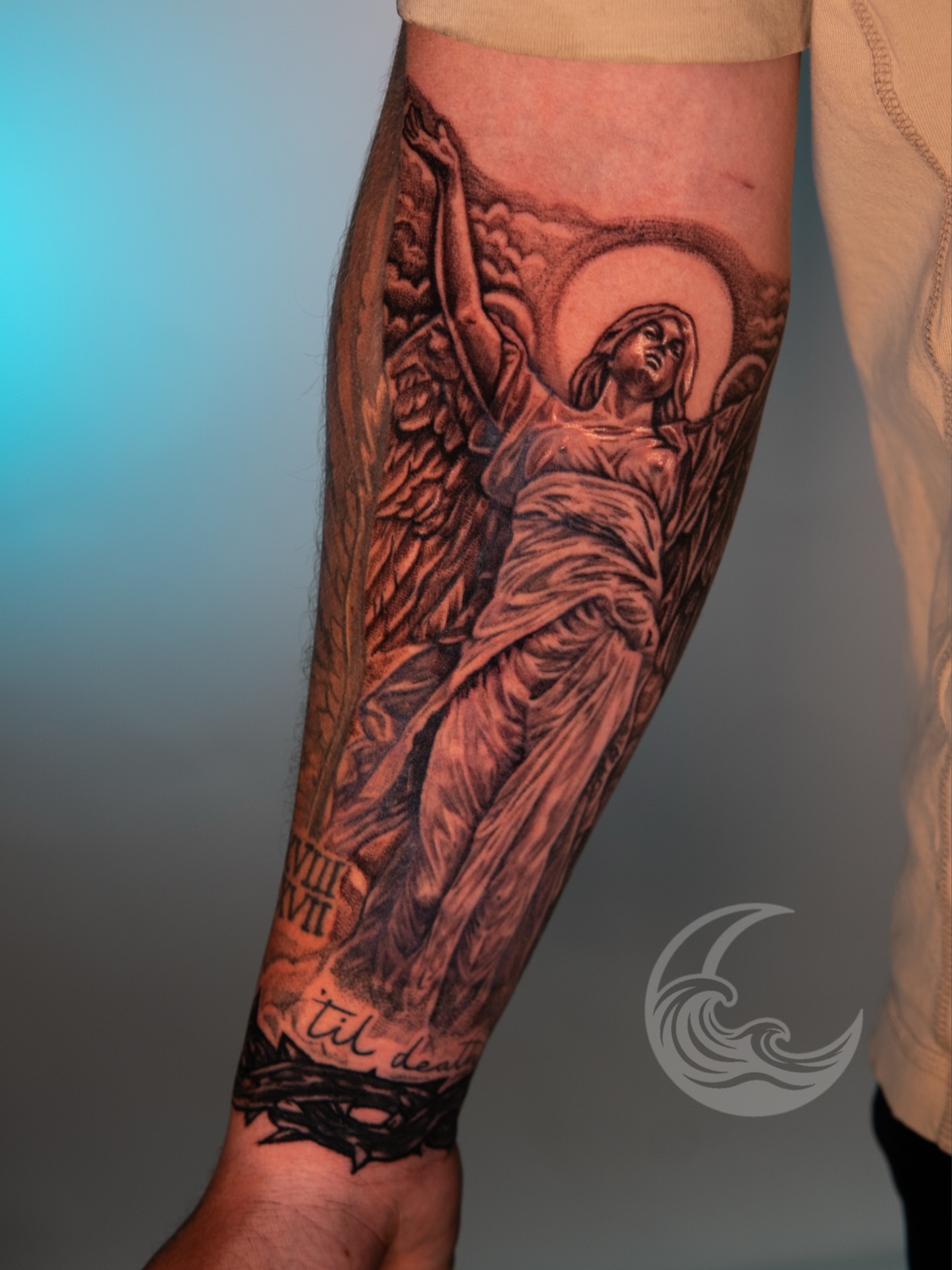 Religious figure realism tattoo on the forearm by Justin custard Tattoo💉Artist 🎨Painter