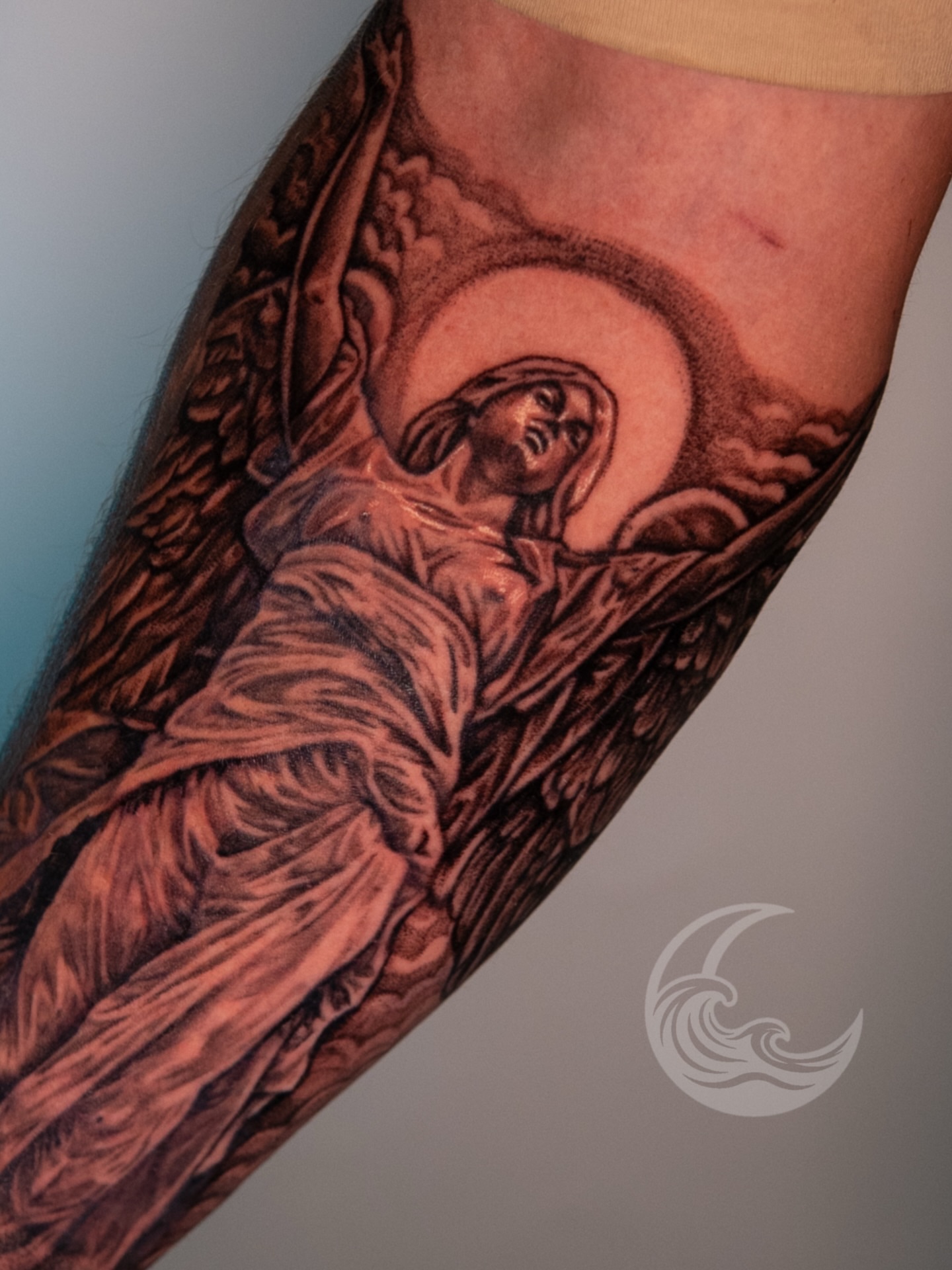 Angel black and grey tattoo on the forearm by Justin custard Tattoo💉Artist 🎨Painter