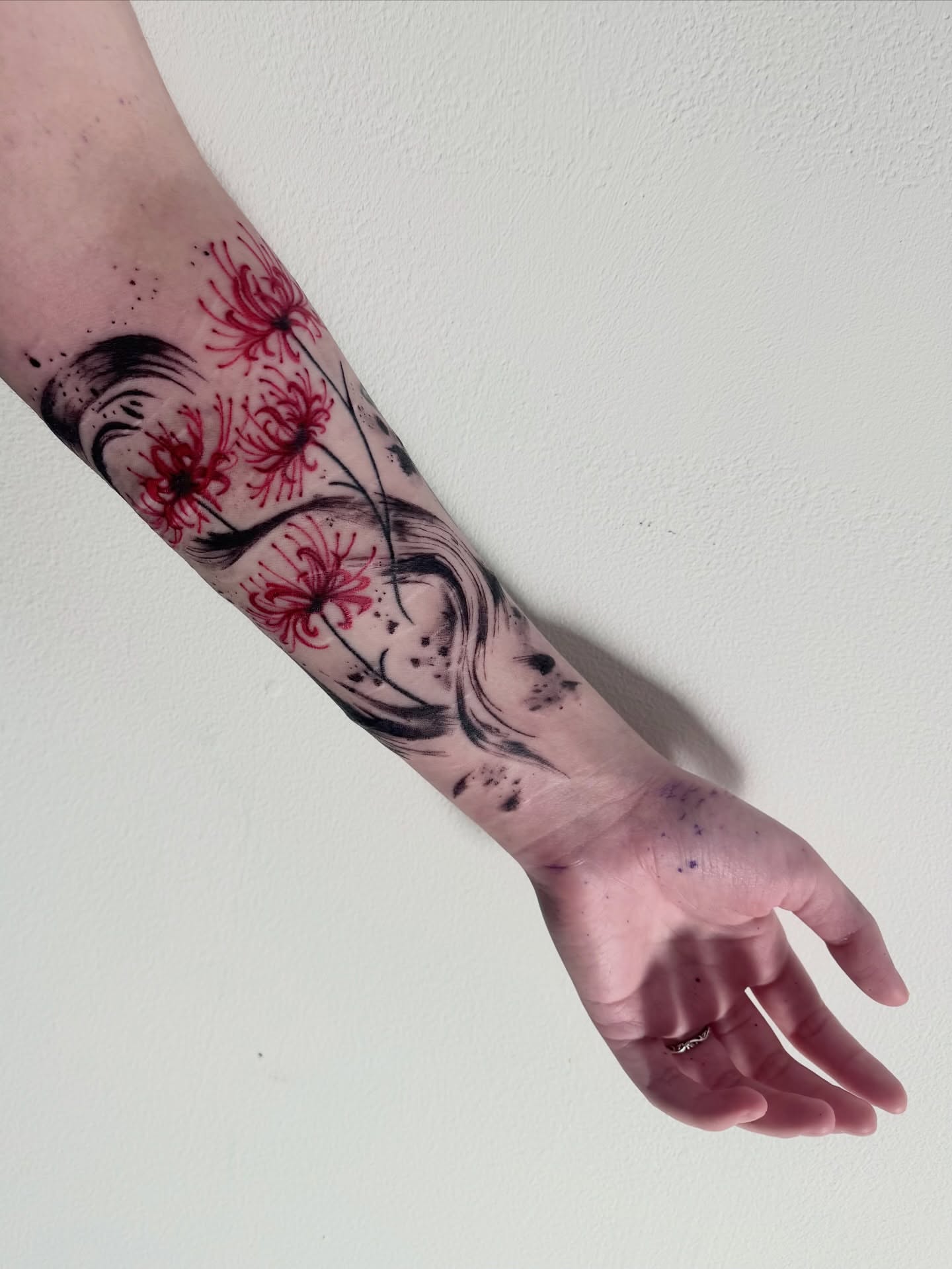Chrysanthemums dotwork tattoo on the forearm by dev