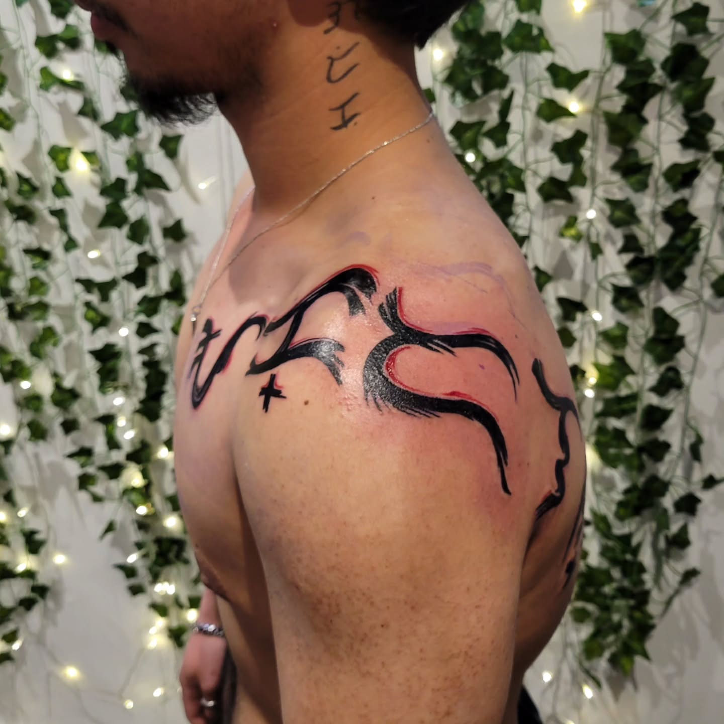 Abstract deer new school tattoo on the shoulder by Uku Tattoos, Cambridge, England