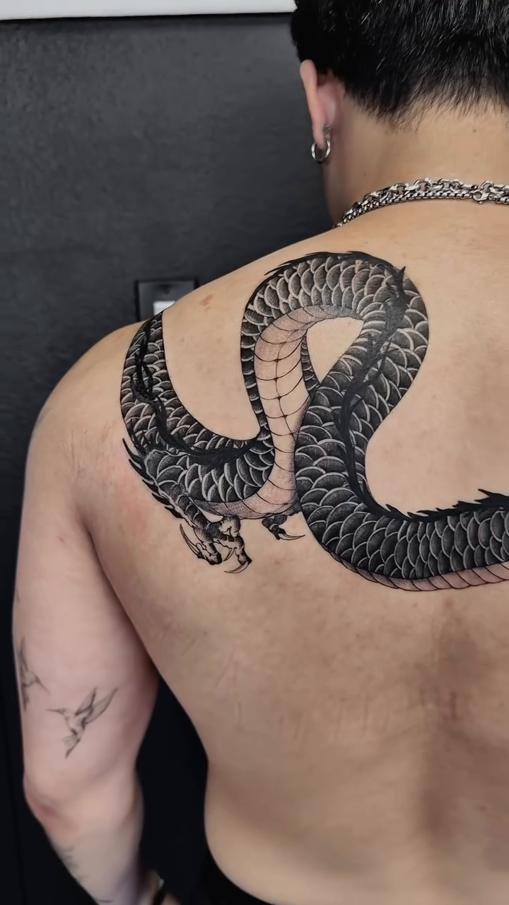 Dragon blackwork tattoo by Sen Tattooer