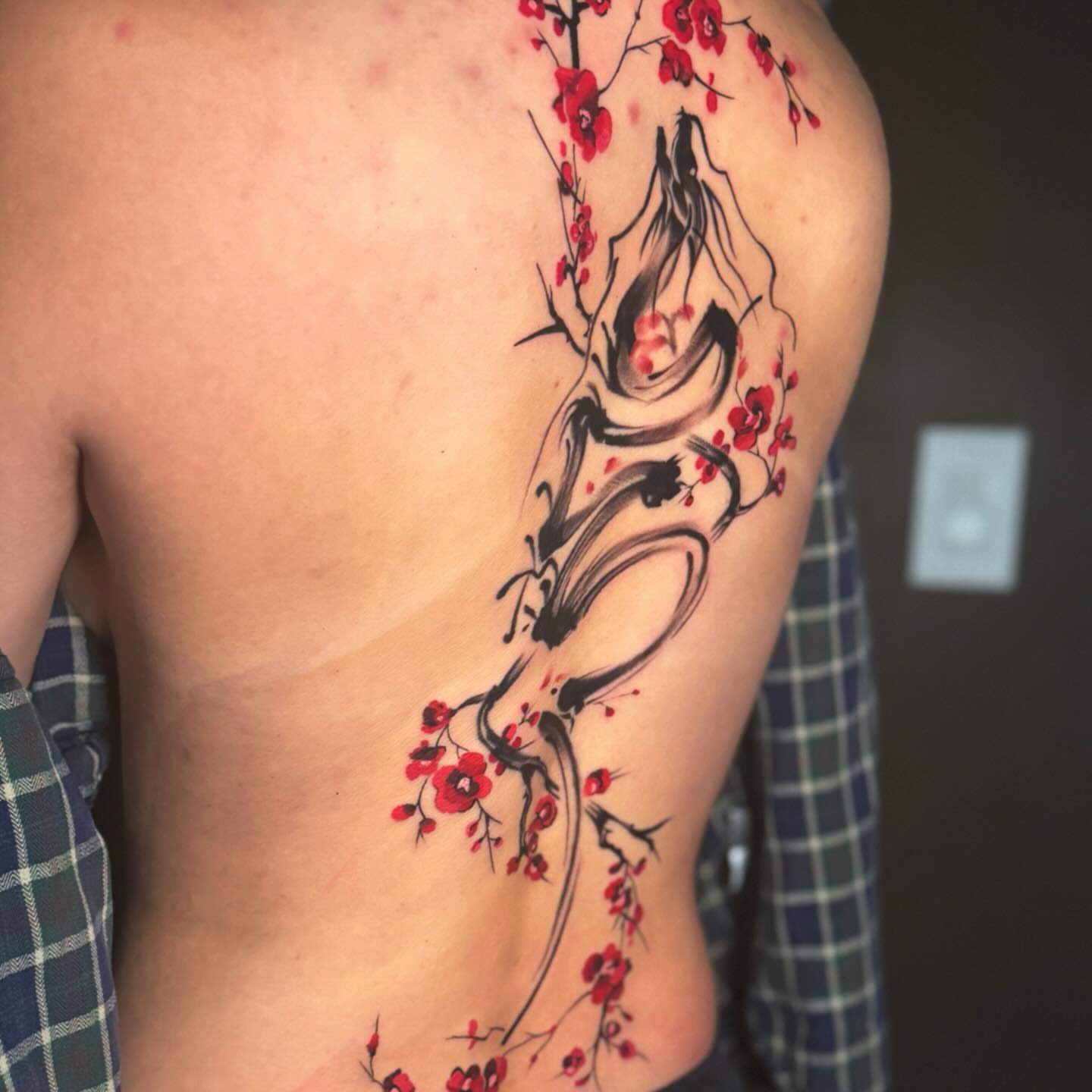 Cherry blossom and dragon japanese irezumi tattoo on the back by Dylan Walker