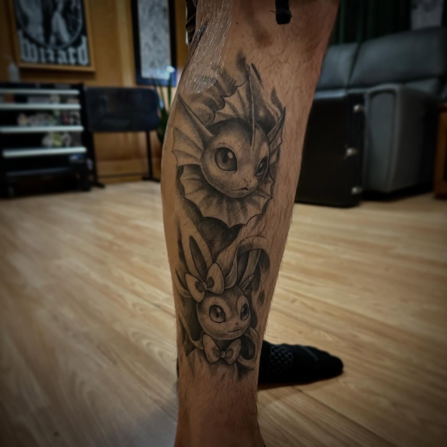 Eevee evolution realism tattoo on the forearm by Sebastian Livingston