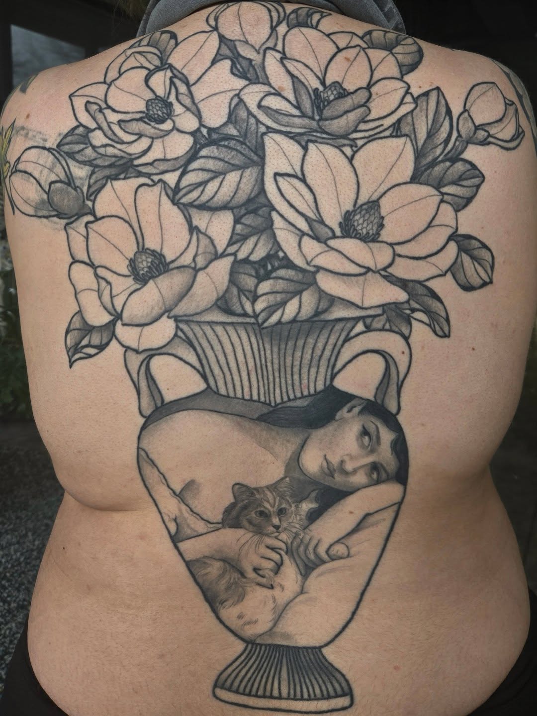 Geometric tattoo on the back by Amanda Hinrichs