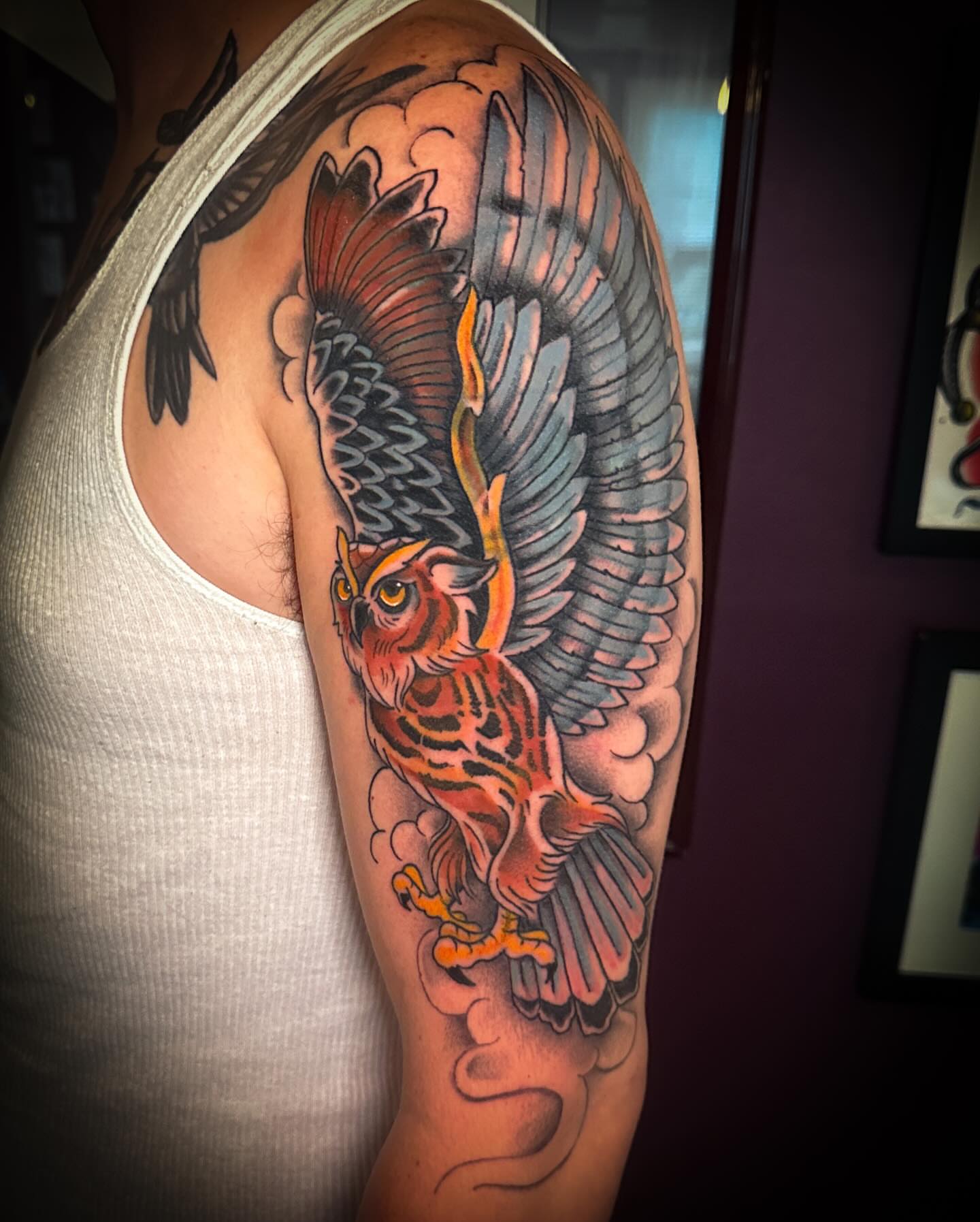 Owl American traditional tattoo on the upper arm by Stacey Colangelo