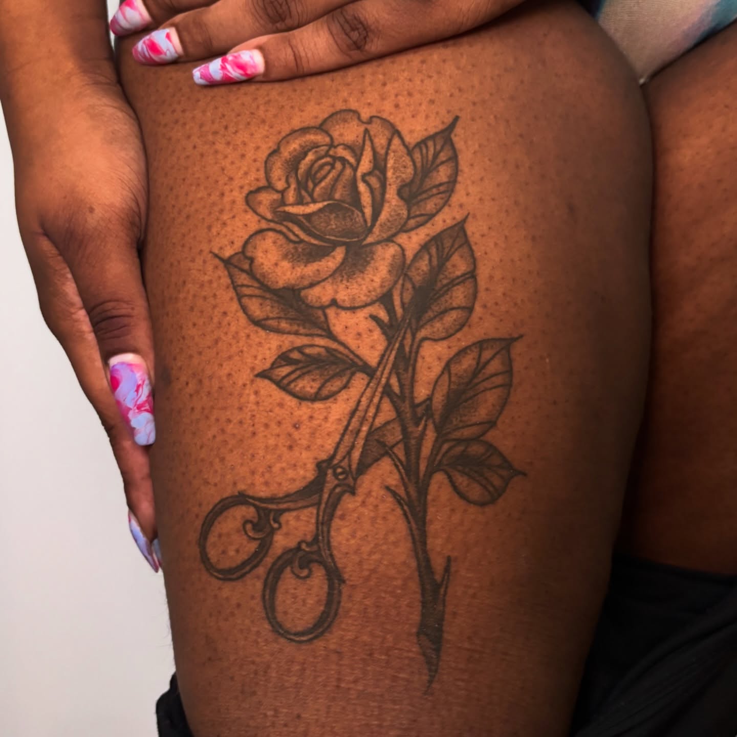 Rose and scissors black and grey tattoo on the thigh by π―πππππ