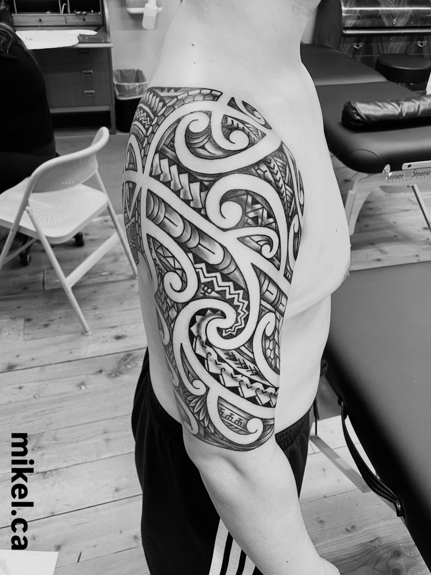 Tribal pattern tribal tattoo on the upper arm by mikel_tattoosangha